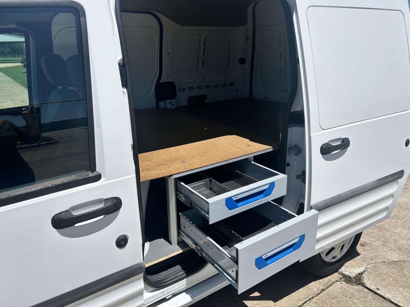 2012 White /Gray Ford Transit Connect XL with Rear Door Glass (NM0LS7AN8CT) with an 2.0L L4 DOHC 16V engine, 4-Speed Automatic transmission, located at 17760 Hwy 62, Morris, OK, 74445, (918) 733-4887, 35.609104, -95.877060 - 2012 FORD TRANSIT CONNECT HAS THE 2.0L ENGINE. THIS IS A DEDICATED CNG THAT ONLY RUNS ON COMPRESSED NATURAL GAS AND IS NOT EQUIPPED TO RUN ON GASOLINE. IT FEATURES MANUAL WINDOWS, MANUAL LOCKS, MANUAL SEATS, CLOTH INTERIOR, BACKUP CAMERA, AM/FM RADIO, STORAGE DRAWERS IN CARGO AREA, 205/65R15 TIRES - Photo#13