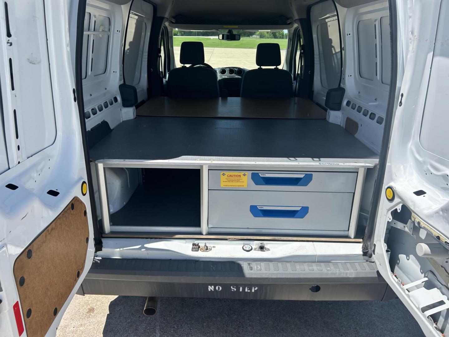 2012 White /Gray Ford Transit Connect XL with Rear Door Glass (NM0LS7AN8CT) with an 2.0L L4 DOHC 16V engine, 4-Speed Automatic transmission, located at 17760 Hwy 62, Morris, OK, 74445, (918) 733-4887, 35.609104, -95.877060 - 2012 FORD TRANSIT CONNECT HAS THE 2.0L ENGINE. THIS IS A DEDICATED CNG THAT ONLY RUNS ON COMPRESSED NATURAL GAS AND IS NOT EQUIPPED TO RUN ON GASOLINE. IT FEATURES MANUAL WINDOWS, MANUAL LOCKS, MANUAL SEATS, CLOTH INTERIOR, BACKUP CAMERA, AM/FM RADIO, STORAGE DRAWERS IN CARGO AREA, 205/65R15 TIRES - Photo#14