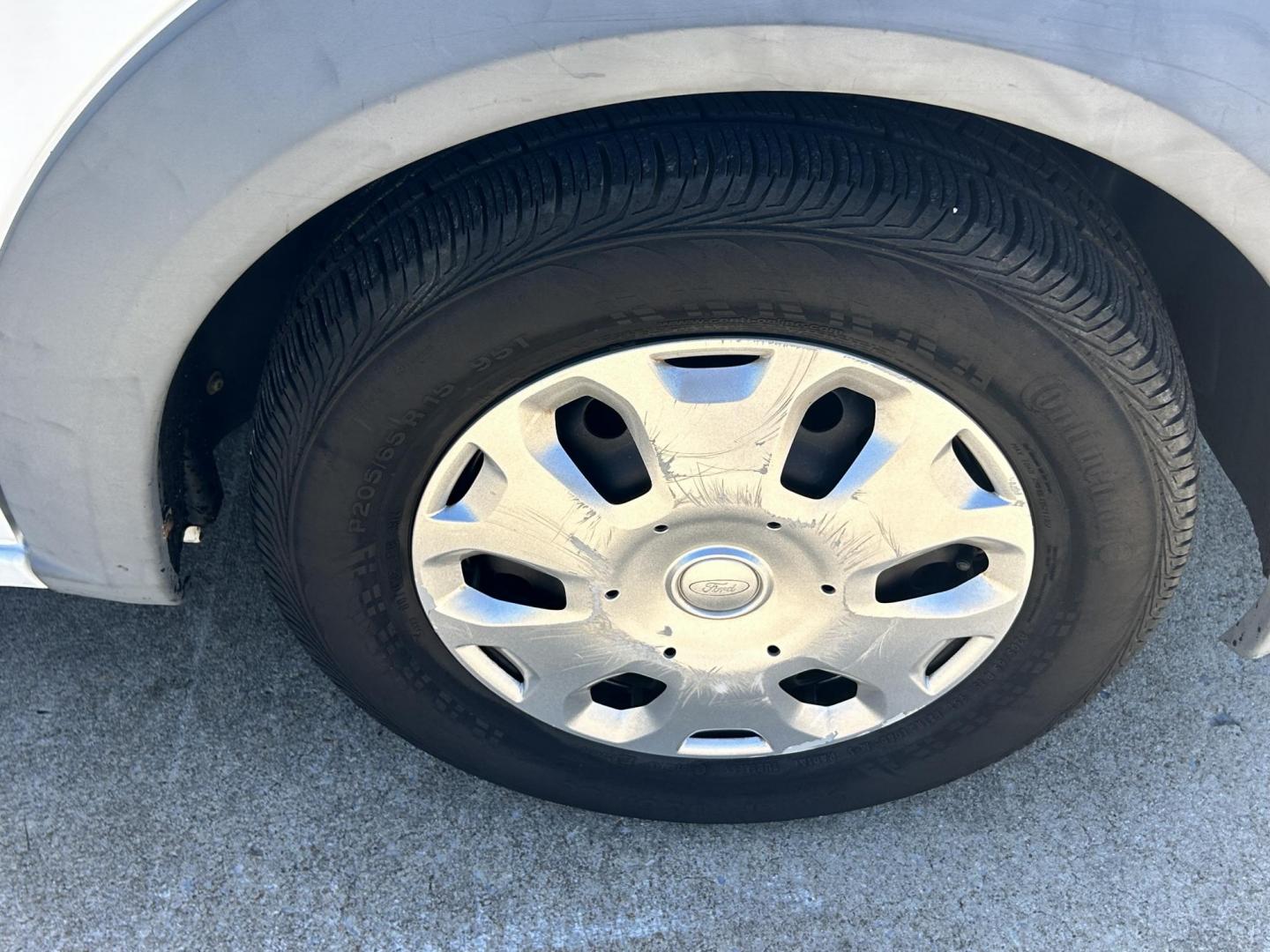 2012 White /Gray Ford Transit Connect XL with Rear Door Glass (NM0LS7AN8CT) with an 2.0L L4 DOHC 16V engine, 4-Speed Automatic transmission, located at 17760 Hwy 62, Morris, OK, 74445, (918) 733-4887, 35.609104, -95.877060 - 2012 FORD TRANSIT CONNECT HAS THE 2.0L ENGINE. THIS IS A DEDICATED CNG THAT ONLY RUNS ON COMPRESSED NATURAL GAS AND IS NOT EQUIPPED TO RUN ON GASOLINE. IT FEATURES MANUAL WINDOWS, MANUAL LOCKS, MANUAL SEATS, CLOTH INTERIOR, BACKUP CAMERA, AM/FM RADIO, STORAGE DRAWERS IN CARGO AREA, 205/65R15 TIRES - Photo#21