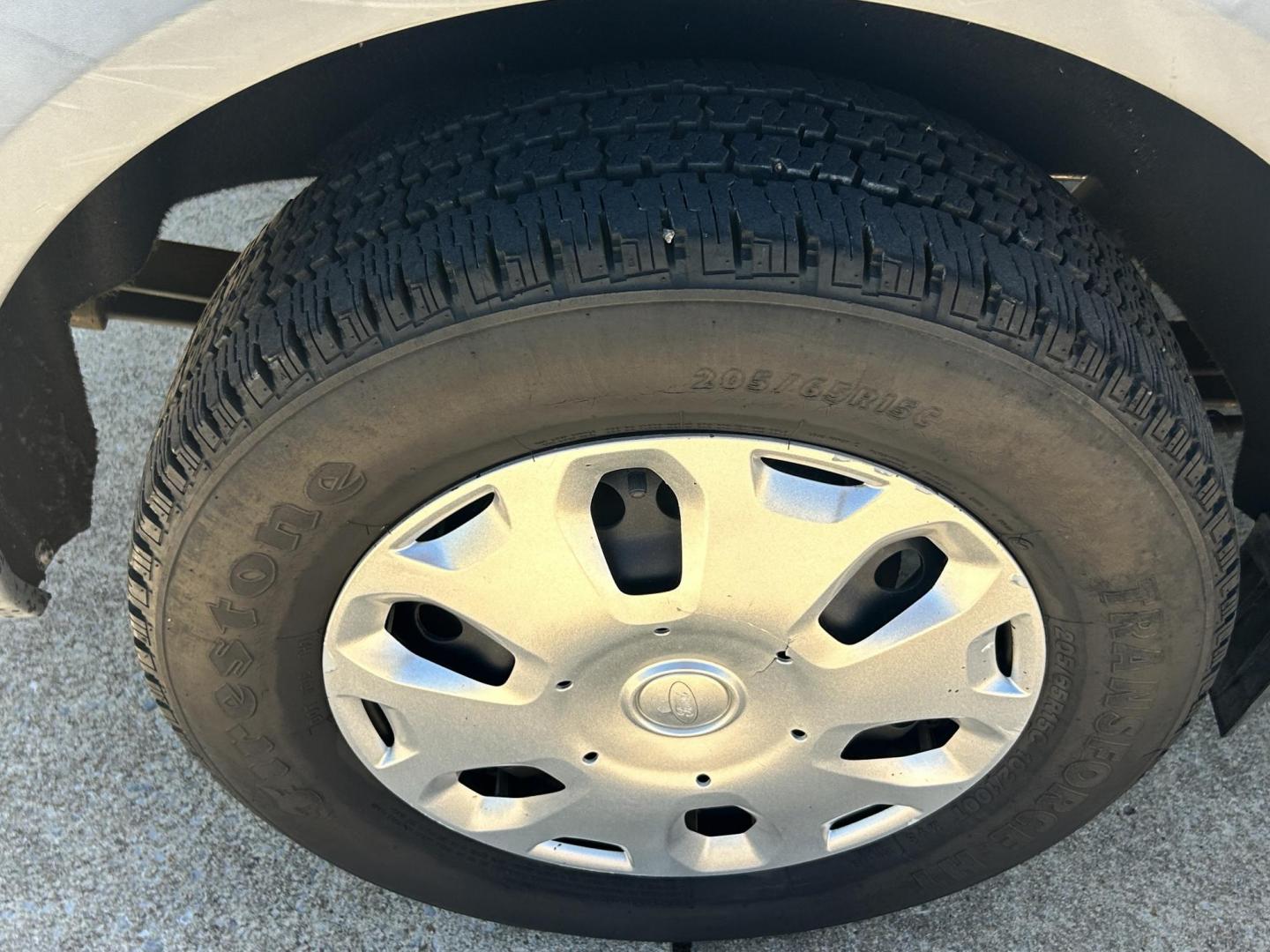 2012 White /Gray Ford Transit Connect XL with Rear Door Glass (NM0LS7AN8CT) with an 2.0L L4 DOHC 16V engine, 4-Speed Automatic transmission, located at 17760 Hwy 62, Morris, OK, 74445, (918) 733-4887, 35.609104, -95.877060 - 2012 FORD TRANSIT CONNECT HAS THE 2.0L ENGINE. THIS IS A DEDICATED CNG THAT ONLY RUNS ON COMPRESSED NATURAL GAS AND IS NOT EQUIPPED TO RUN ON GASOLINE. IT FEATURES MANUAL WINDOWS, MANUAL LOCKS, MANUAL SEATS, CLOTH INTERIOR, BACKUP CAMERA, AM/FM RADIO, STORAGE DRAWERS IN CARGO AREA, 205/65R15 TIRES - Photo#22