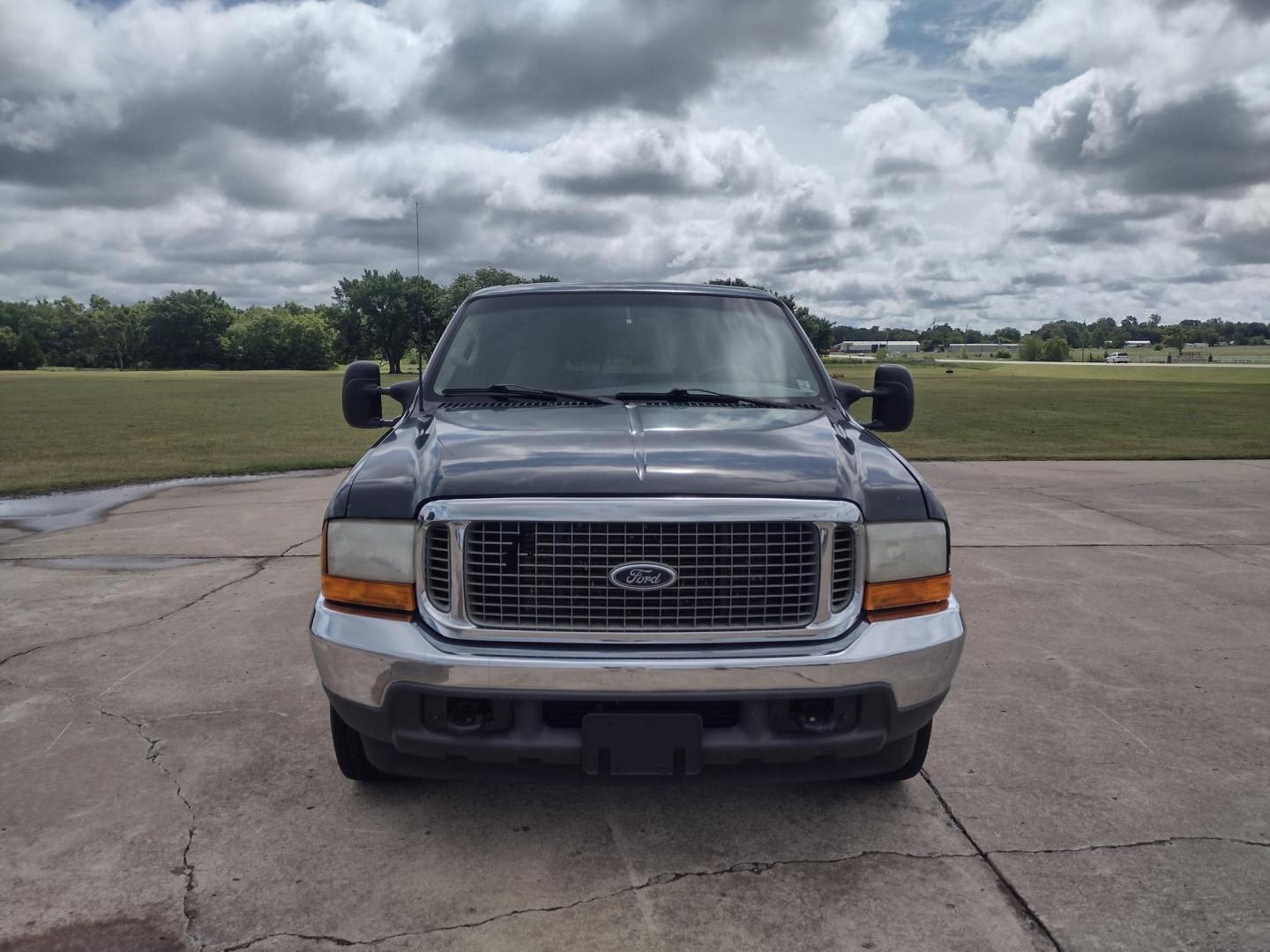 2001 DARK GREEN /TAN Ford Excursion XLT 2WD (1FMNU40S21E) with an 6.8L V10 SOHC 20V engine, 4-Speed Automatic Overdrive transmission, located at 17760 Hwy 62, Morris, OK, 74445, (918) 733-4887, 35.609104, -95.877060 - 2001 FORD EXCURSION XLT 2WD HAS THE 6.8L V10 ENGINE. FEATURES POWER DRIVER SEAT, MANUAL PASSENGER SEAT, POWER LOCKS, POWER WINDOWS, POWER MIRRORS, LEATHER INTERIOR, TOUCH SCREEN AM/FM RADIO, BLUETOOTH RADIO, AUXILLARY PORT, USB PORT, CRUISE CONTROL, 2ND AND 3RD ROW SEATING, REAR AC CONTROL, AND TRAI - Photo#1