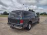 2001 DARK GREEN /TAN Ford Excursion XLT 2WD (1FMNU40S21E) with an 6.8L V10 SOHC 20V engine, 4-Speed Automatic Overdrive transmission, located at 17760 Hwy 62, Morris, OK, 74445, (918) 733-4887, 35.609104, -95.877060 - 2001 FORD EXCURSION XLT 2WD HAS THE 6.8L V10 ENGINE. FEATURES POWER DRIVER SEAT, MANUAL PASSENGER SEAT, POWER LOCKS, POWER WINDOWS, POWER MIRRORS, LEATHER INTERIOR, TOUCH SCREEN AM/FM RADIO, BLUETOOTH RADIO, AUXILLARY PORT, USB PORT, CRUISE CONTROL, 2ND AND 3RD ROW SEATING, REAR AC CONTROL, AND TRAI - Photo#4