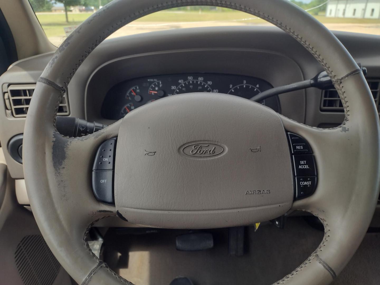 2001 DARK GREEN /TAN Ford Excursion XLT 2WD (1FMNU40S21E) with an 6.8L V10 SOHC 20V engine, 4-Speed Automatic Overdrive transmission, located at 17760 Hwy 62, Morris, OK, 74445, (918) 733-4887, 35.609104, -95.877060 - 2001 FORD EXCURSION XLT 2WD HAS THE 6.8L V10 ENGINE. FEATURES POWER DRIVER SEAT, MANUAL PASSENGER SEAT, POWER LOCKS, POWER WINDOWS, POWER MIRRORS, LEATHER INTERIOR, TOUCH SCREEN AM/FM RADIO, BLUETOOTH RADIO, AUXILLARY PORT, USB PORT, CRUISE CONTROL, 2ND AND 3RD ROW SEATING, REAR AC CONTROL, AND TRAI - Photo#9