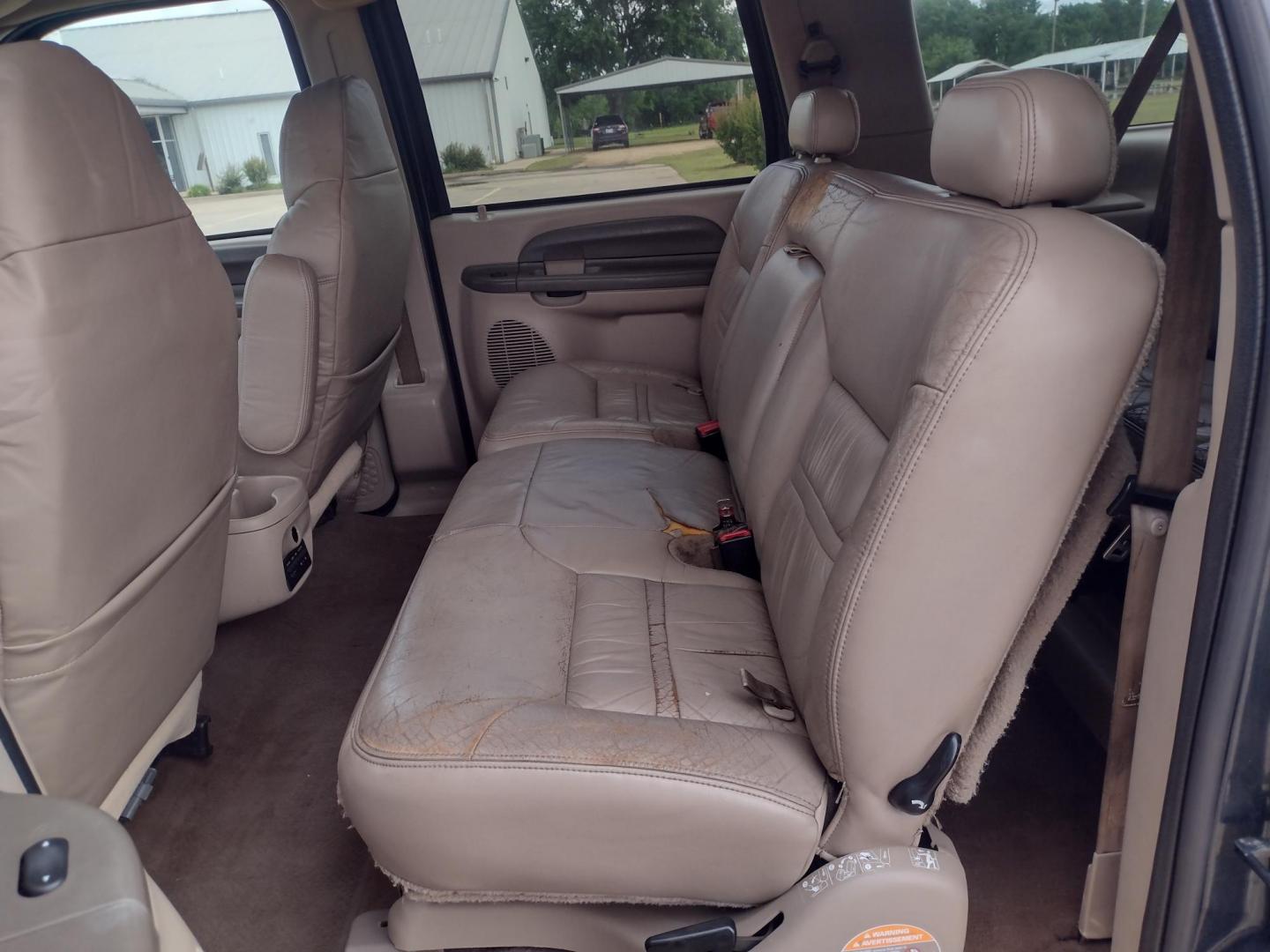 2001 DARK GREEN /TAN Ford Excursion XLT 2WD (1FMNU40S21E) with an 6.8L V10 SOHC 20V engine, 4-Speed Automatic Overdrive transmission, located at 17760 Hwy 62, Morris, OK, 74445, (918) 733-4887, 35.609104, -95.877060 - 2001 FORD EXCURSION XLT 2WD HAS THE 6.8L V10 ENGINE. FEATURES POWER DRIVER SEAT, MANUAL PASSENGER SEAT, POWER LOCKS, POWER WINDOWS, POWER MIRRORS, LEATHER INTERIOR, TOUCH SCREEN AM/FM RADIO, BLUETOOTH RADIO, AUXILLARY PORT, USB PORT, CRUISE CONTROL, 2ND AND 3RD ROW SEATING, REAR AC CONTROL, AND TRAI - Photo#17