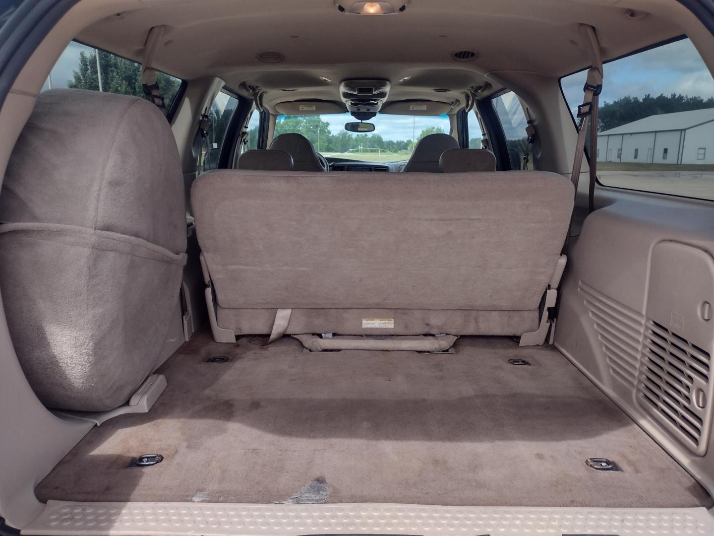 2001 DARK GREEN /TAN Ford Excursion XLT 2WD (1FMNU40S21E) with an 6.8L V10 SOHC 20V engine, 4-Speed Automatic Overdrive transmission, located at 17760 Hwy 62, Morris, OK, 74445, (918) 733-4887, 35.609104, -95.877060 - 2001 FORD EXCURSION XLT 2WD HAS THE 6.8L V10 ENGINE. FEATURES POWER DRIVER SEAT, MANUAL PASSENGER SEAT, POWER LOCKS, POWER WINDOWS, POWER MIRRORS, LEATHER INTERIOR, TOUCH SCREEN AM/FM RADIO, BLUETOOTH RADIO, AUXILLARY PORT, USB PORT, CRUISE CONTROL, 2ND AND 3RD ROW SEATING, REAR AC CONTROL, AND TRAI - Photo#22