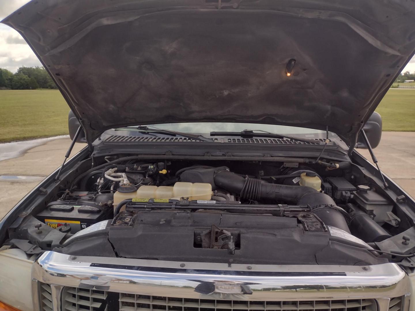 2001 DARK GREEN /TAN Ford Excursion XLT 2WD (1FMNU40S21E) with an 6.8L V10 SOHC 20V engine, 4-Speed Automatic Overdrive transmission, located at 17760 Hwy 62, Morris, OK, 74445, (918) 733-4887, 35.609104, -95.877060 - 2001 FORD EXCURSION XLT 2WD HAS THE 6.8L V10 ENGINE. FEATURES POWER DRIVER SEAT, MANUAL PASSENGER SEAT, POWER LOCKS, POWER WINDOWS, POWER MIRRORS, LEATHER INTERIOR, TOUCH SCREEN AM/FM RADIO, BLUETOOTH RADIO, AUXILLARY PORT, USB PORT, CRUISE CONTROL, 2ND AND 3RD ROW SEATING, REAR AC CONTROL, AND TRAI - Photo#24