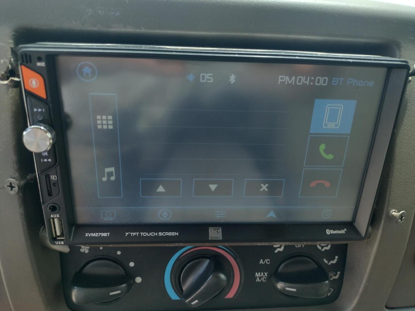 2001 DARK GREEN /TAN Ford Excursion XLT 2WD (1FMNU40S21E) with an 6.8L V10 SOHC 20V engine, 4-Speed Automatic Overdrive transmission, located at 17760 Hwy 62, Morris, OK, 74445, (918) 733-4887, 35.609104, -95.877060 - 2001 FORD EXCURSION XLT 2WD HAS THE 6.8L V10 ENGINE. FEATURES POWER DRIVER SEAT, MANUAL PASSENGER SEAT, POWER LOCKS, POWER WINDOWS, POWER MIRRORS, LEATHER INTERIOR, TOUCH SCREEN AM/FM RADIO, BLUETOOTH RADIO, AUXILLARY PORT, USB PORT, CRUISE CONTROL, 2ND AND 3RD ROW SEATING, REAR AC CONTROL, AND TRAI - Photo#14