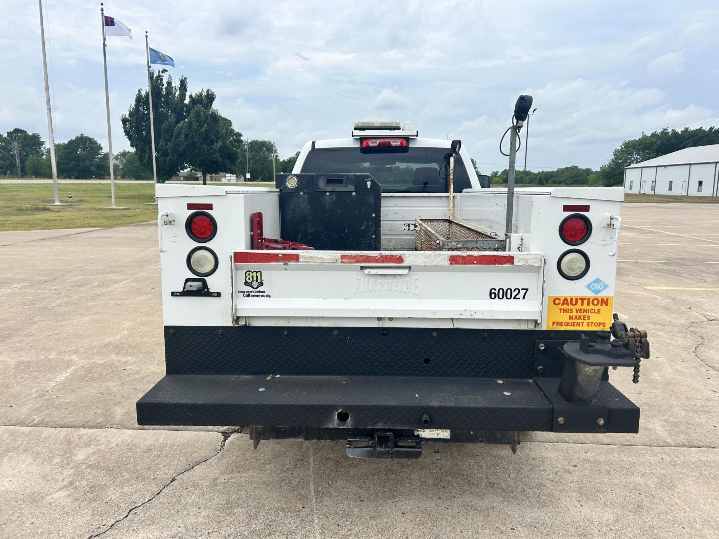 2015 White /Gray Chevrolet Silverado 2500HD Work Truck Double Cab 2WD (1GC2CUEG3FZ) with an 6.0L V8 OHV 16V FFV engine, 6-Speed Automatic transmission, located at 17760 Hwy 62, Morris, OK, 74445, (918) 733-4887, 35.609104, -95.877060 - 2015 CHEVY SILVERADO 2500 HD HAS THE 6.0L V8 AND IS 2WD. IT FEATURES POWER LOCKS, POWER WINDOWS, MANUAL SEATS, CLOTH INTERIOR, NO BACK SEAT REMOVED FOR WORK SHELVING, AM/FM RADIO, BACKUP CAMERA, TRACTION CONTOL, TOOL BED, PIPE VICE AND HITCH. IT RUNS ON CNG (COMPRESSED NATURAL GAS) OR GASOLINE. A PR - Photo#5
