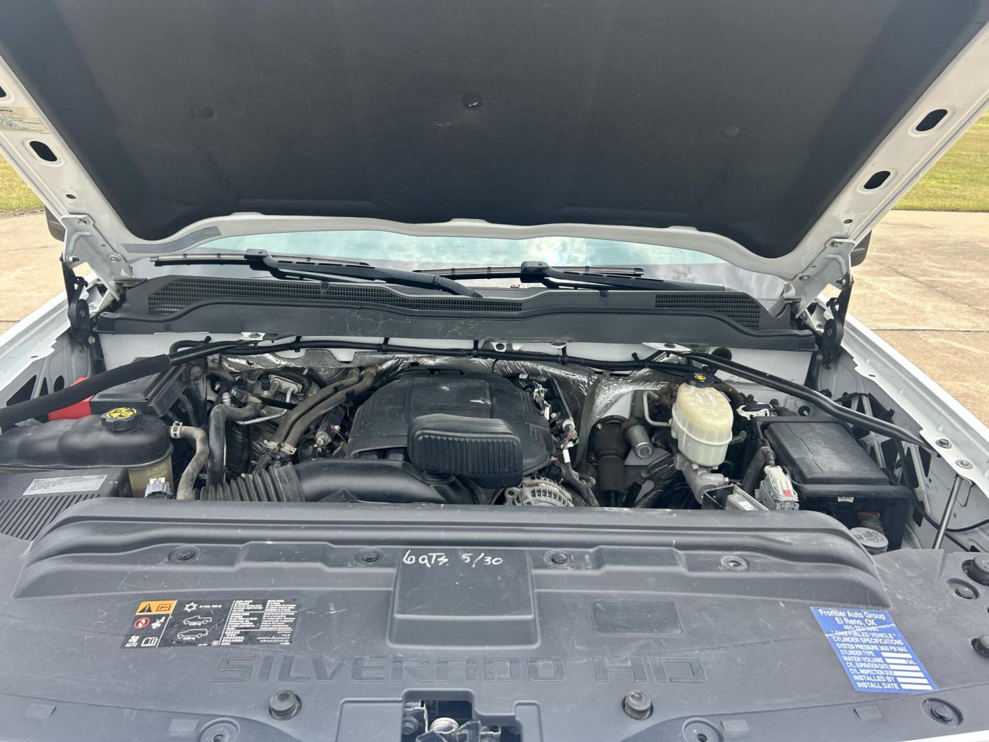 2015 White /Gray Chevrolet Silverado 2500HD Work Truck Double Cab 2WD (1GC2CUEG3FZ) with an 6.0L V8 OHV 16V FFV engine, 6-Speed Automatic transmission, located at 17760 Hwy 62, Morris, OK, 74445, (918) 733-4887, 35.609104, -95.877060 - 2015 CHEVY SILVERADO 2500 HD HAS THE 6.0L V8 AND IS 2WD. IT FEATURES POWER LOCKS, POWER WINDOWS, MANUAL SEATS, CLOTH INTERIOR, NO BACK SEAT REMOVED FOR WORK SHELVING, AM/FM RADIO, BACKUP CAMERA, TRACTION CONTOL, TOOL BED, PIPE VICE AND HITCH. IT RUNS ON CNG (COMPRESSED NATURAL GAS) OR GASOLINE. A PR - Photo#21