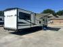 2020 WHITE Forest River OZARK TRAIL 2700THX 2700THX (4X4TZKC27LY) , located at 17760 Hwy 62, Morris, OK, 74445, 35.609104, -95.877060 - CAMPING SEASON IS HERE CHECK OUT THIS 2020 FOREST RIVER OZARK TRAIL 2700THX TOY HAULER 31FT OVERALL WITH 15FT POWER AWNING. IN THE FRONT IS THE QUEEN SIZE BED WITH STORAGE UNDER THE BED, OVERHEAD CABINET, AND WARDROBE CLOSET. IN THE LIVING AND KITCHEN AREA IS A U-SHAPED DINETTE THAT FOLDS DOWN FOR A - Photo#2
