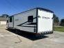 2020 WHITE Forest River OZARK TRAIL 2700THX 2700THX (4X4TZKC27LY) , located at 17760 Hwy 62, Morris, OK, 74445, 35.609104, -95.877060 - CAMPING SEASON IS HERE CHECK OUT THIS 2020 FOREST RIVER OZARK TRAIL 2700THX TOY HAULER 31FT OVERALL WITH 15FT POWER AWNING. IN THE FRONT IS THE QUEEN SIZE BED WITH STORAGE UNDER THE BED, OVERHEAD CABINET, AND WARDROBE CLOSET. IN THE LIVING AND KITCHEN AREA IS A U-SHAPED DINETTE THAT FOLDS DOWN FOR A - Photo#4