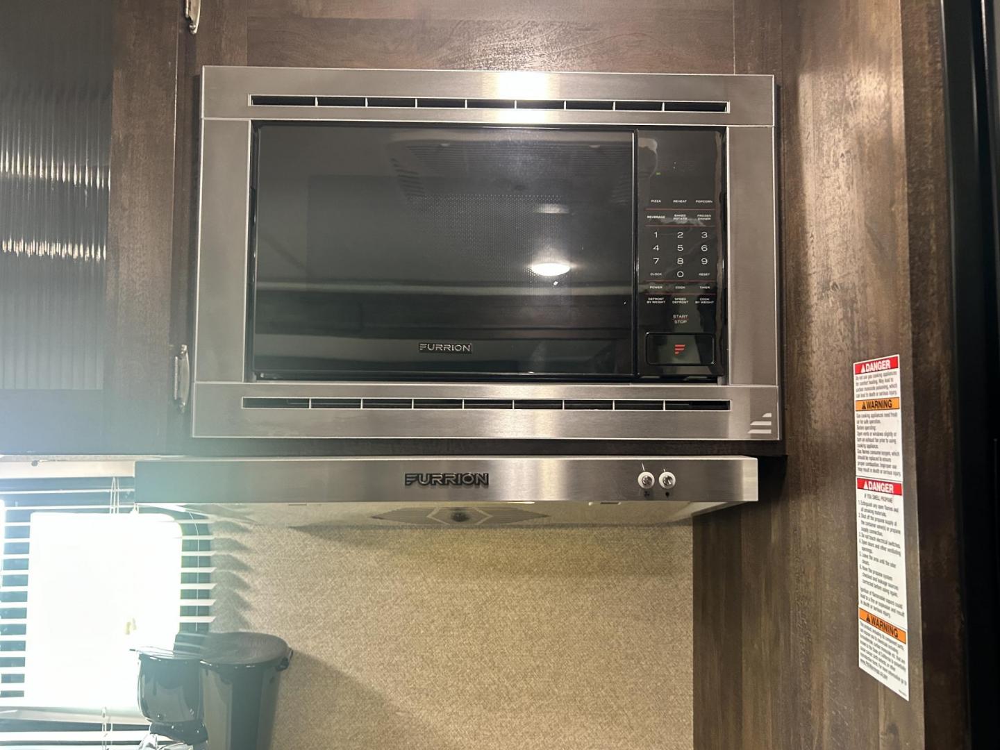 2020 WHITE Forest River OZARK TRAIL 2700THX 2700THX (4X4TZKC27LY) , located at 17760 Hwy 62, Morris, OK, 74445, 35.609104, -95.877060 - CAMPING SEASON IS HERE CHECK OUT THIS 2020 FOREST RIVER OZARK TRAIL 2700THX TOY HAULER 31FT OVERALL WITH 15FT POWER AWNING. IN THE FRONT IS THE QUEEN SIZE BED WITH STORAGE UNDER THE BED, OVERHEAD CABINET, AND WARDROBE CLOSET. IN THE LIVING AND KITCHEN AREA IS A U-SHAPED DINETTE THAT FOLDS DOWN FOR A - Photo#17