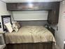 2020 WHITE Forest River OZARK TRAIL 2700THX 2700THX (4X4TZKC27LY) , located at 17760 Hwy 62, Morris, OK, 74445, 35.609104, -95.877060 - CAMPING SEASON IS HERE CHECK OUT THIS 2020 FOREST RIVER OZARK TRAIL 2700THX TOY HAULER 31FT OVERALL WITH 15FT POWER AWNING. IN THE FRONT IS THE QUEEN SIZE BED WITH STORAGE UNDER THE BED, OVERHEAD CABINET, AND WARDROBE CLOSET. IN THE LIVING AND KITCHEN AREA IS A U-SHAPED DINETTE THAT FOLDS DOWN FOR A - Photo#19