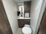 2020 WHITE Forest River OZARK TRAIL 2700THX 2700THX (4X4TZKC27LY) , located at 17760 Hwy 62, Morris, OK, 74445, 35.609104, -95.877060 - CAMPING SEASON IS HERE CHECK OUT THIS 2020 FOREST RIVER OZARK TRAIL 2700THX TOY HAULER 31FT OVERALL WITH 15FT POWER AWNING. IN THE FRONT IS THE QUEEN SIZE BED WITH STORAGE UNDER THE BED, OVERHEAD CABINET, AND WARDROBE CLOSET. IN THE LIVING AND KITCHEN AREA IS A U-SHAPED DINETTE THAT FOLDS DOWN FOR A - Photo#23