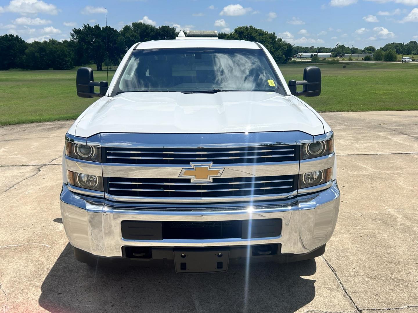 2017 WHITE /Gray Chevrolet Silverado 2500HD Work Truck Double Cab 2WD (1GC2CUEG1HZ) with an 6.0L V8 OHV 16V FFV engine, 6A transmission, located at 17760 Hwy 62, Morris, OK, 74445, (918) 733-4887, 35.609104, -95.877060 - 2017 CHEVY SILVERADO 2500 HD HAS THE 6.0L V8 AND IS 2WD. IT FEATURES POWER LOCKS, POWER WINDOWS, MANUAL SEATS, LEATHER INTERIOR, NO BACK SEAT REMOVED FOR WORK SHELVING, AM/FM RADIO, BACKUP CAMERA, TRACTION CONTOL, TRAILER BRAKES, TOOL BED, AND HITCH. IT RUNS ON CNG (COMPRESSED NATURAL GAS) A PREMIE - Photo#1