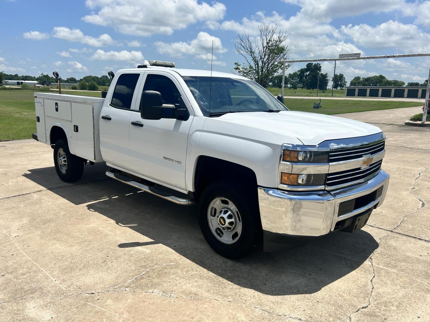 2017 WHITE /Gray Chevrolet Silverado 2500HD Work Truck Double Cab 2WD (1GC2CUEG1HZ) with an 6.0L V8 OHV 16V FFV engine, 6A transmission, located at 17760 Hwy 62, Morris, OK, 74445, (918) 733-4887, 35.609104, -95.877060 - 2017 CHEVY SILVERADO 2500 HD HAS THE 6.0L V8 AND IS 2WD. IT FEATURES POWER LOCKS, POWER WINDOWS, MANUAL SEATS, LEATHER INTERIOR, NO BACK SEAT REMOVED FOR WORK SHELVING, AM/FM RADIO, BACKUP CAMERA, TRACTION CONTOL, TRAILER BRAKES, TOOL BED, AND HITCH. IT RUNS ON CNG (COMPRESSED NATURAL GAS) A PREMIE - Photo#0