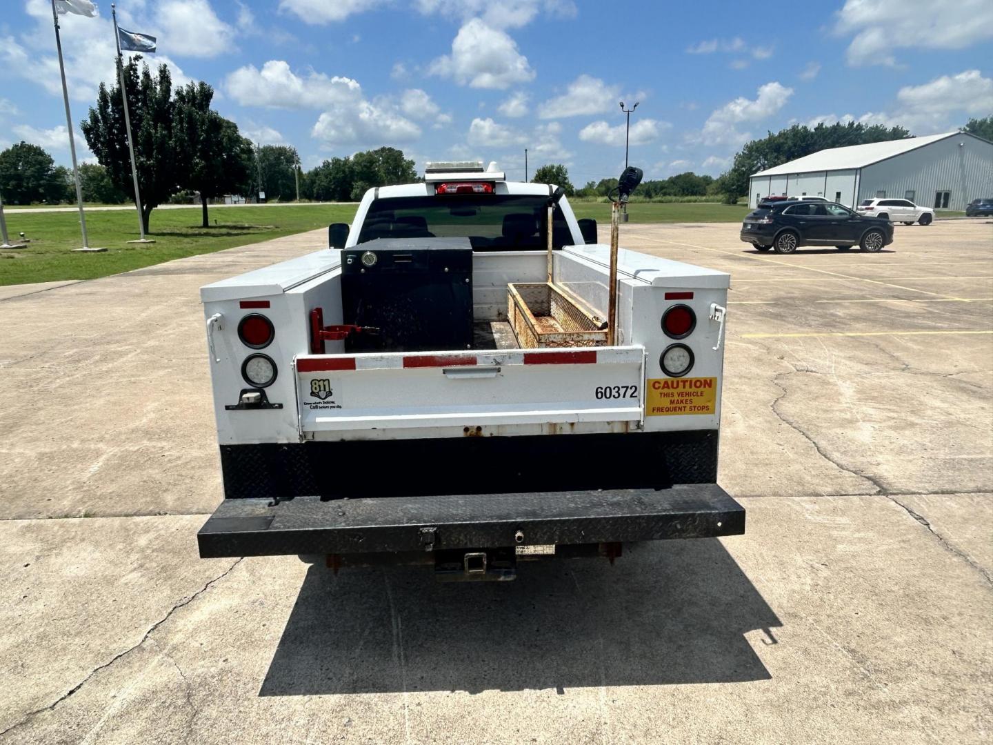 2017 WHITE /Gray Chevrolet Silverado 2500HD Work Truck Double Cab 2WD (1GC2CUEG1HZ) with an 6.0L V8 OHV 16V FFV engine, 6A transmission, located at 17760 Hwy 62, Morris, OK, 74445, (918) 733-4887, 35.609104, -95.877060 - 2017 CHEVY SILVERADO 2500 HD HAS THE 6.0L V8 AND IS 2WD. IT FEATURES POWER LOCKS, POWER WINDOWS, MANUAL SEATS, LEATHER INTERIOR, NO BACK SEAT REMOVED FOR WORK SHELVING, AM/FM RADIO, BACKUP CAMERA, TRACTION CONTOL, TRAILER BRAKES, TOOL BED, AND HITCH. IT RUNS ON CNG (COMPRESSED NATURAL GAS) A PREMIE - Photo#4