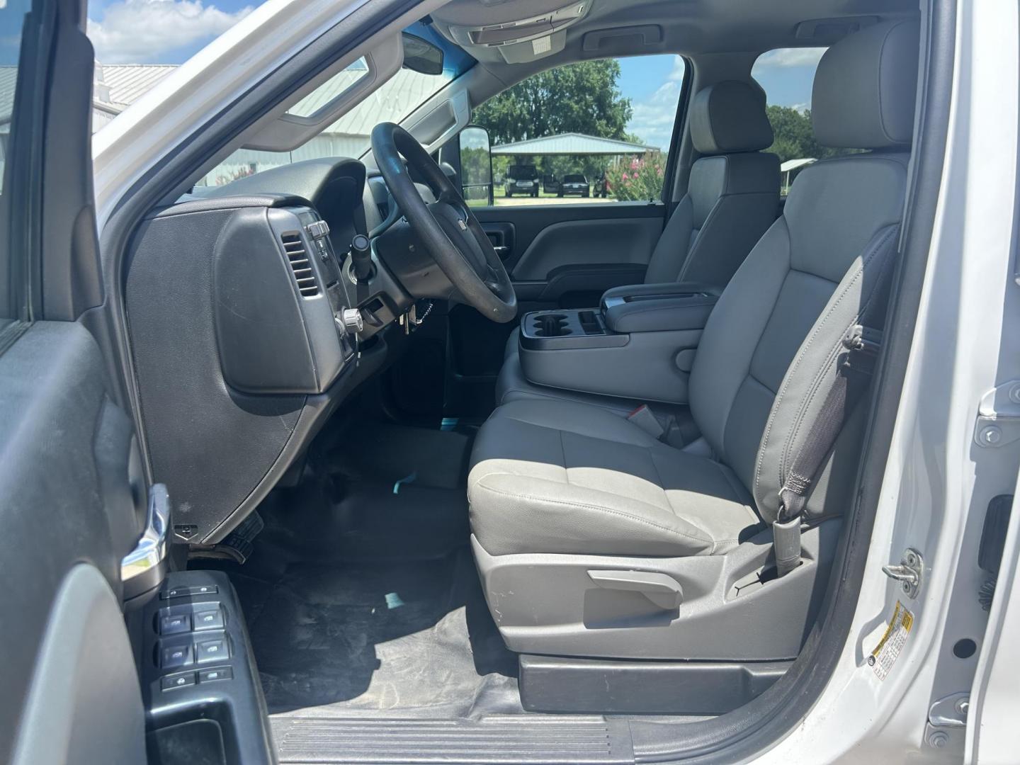 2017 WHITE /Gray Chevrolet Silverado 2500HD Work Truck Double Cab 2WD (1GC2CUEG1HZ) with an 6.0L V8 OHV 16V FFV engine, 6A transmission, located at 17760 Hwy 62, Morris, OK, 74445, (918) 733-4887, 35.609104, -95.877060 - 2017 CHEVY SILVERADO 2500 HD HAS THE 6.0L V8 AND IS 2WD. IT FEATURES POWER LOCKS, POWER WINDOWS, MANUAL SEATS, LEATHER INTERIOR, NO BACK SEAT REMOVED FOR WORK SHELVING, AM/FM RADIO, BACKUP CAMERA, TRACTION CONTOL, TRAILER BRAKES, TOOL BED, AND HITCH. IT RUNS ON CNG (COMPRESSED NATURAL GAS) A PREMIE - Photo#7