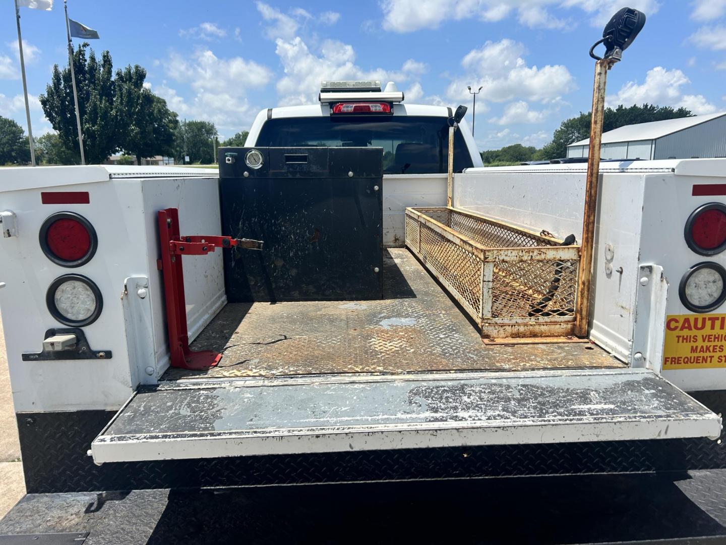 2017 WHITE /Gray Chevrolet Silverado 2500HD Work Truck Double Cab 2WD (1GC2CUEG1HZ) with an 6.0L V8 OHV 16V FFV engine, 6A transmission, located at 17760 Hwy 62, Morris, OK, 74445, (918) 733-4887, 35.609104, -95.877060 - 2017 CHEVY SILVERADO 2500 HD HAS THE 6.0L V8 AND IS 2WD. IT FEATURES POWER LOCKS, POWER WINDOWS, MANUAL SEATS, LEATHER INTERIOR, NO BACK SEAT REMOVED FOR WORK SHELVING, AM/FM RADIO, BACKUP CAMERA, TRACTION CONTOL, TRAILER BRAKES, TOOL BED, AND HITCH. IT RUNS ON CNG (COMPRESSED NATURAL GAS) A PREMIE - Photo#16