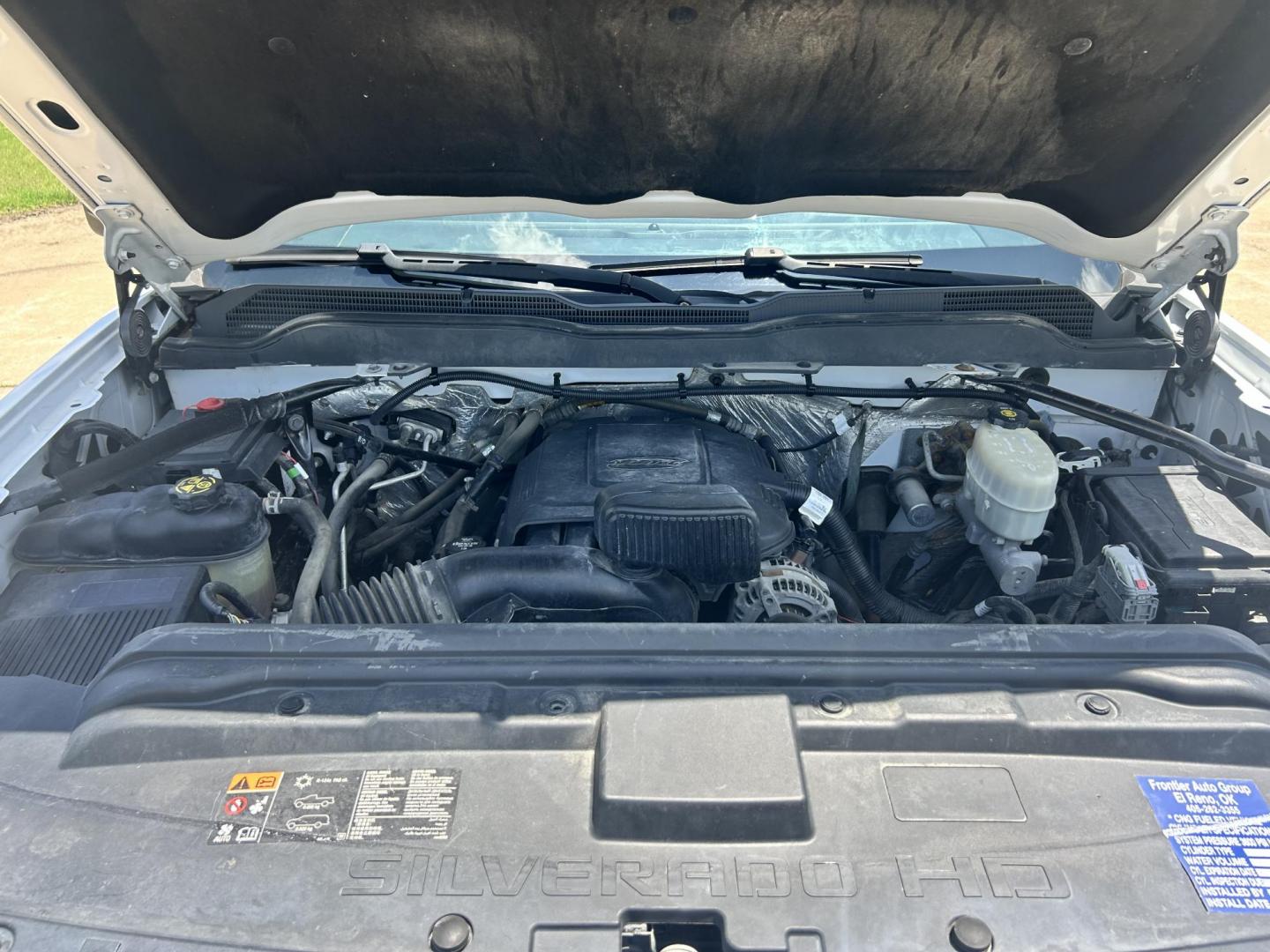 2017 WHITE /Gray Chevrolet Silverado 2500HD Work Truck Double Cab 2WD (1GC2CUEG1HZ) with an 6.0L V8 OHV 16V FFV engine, 6A transmission, located at 17760 Hwy 62, Morris, OK, 74445, (918) 733-4887, 35.609104, -95.877060 - 2017 CHEVY SILVERADO 2500 HD HAS THE 6.0L V8 AND IS 2WD. IT FEATURES POWER LOCKS, POWER WINDOWS, MANUAL SEATS, LEATHER INTERIOR, NO BACK SEAT REMOVED FOR WORK SHELVING, AM/FM RADIO, BACKUP CAMERA, TRACTION CONTOL, TRAILER BRAKES, TOOL BED, AND HITCH. IT RUNS ON CNG (COMPRESSED NATURAL GAS) A PREMIE - Photo#18