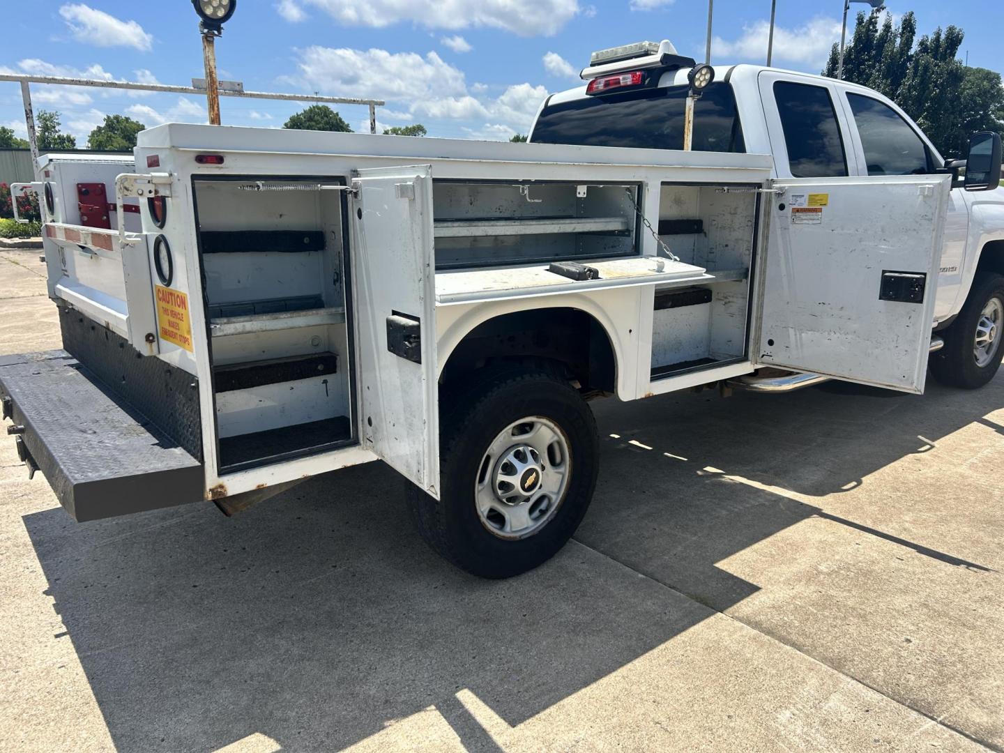 2017 WHITE /Gray Chevrolet Silverado 2500HD Work Truck Double Cab 2WD (1GC2CUEG1HZ) with an 6.0L V8 OHV 16V FFV engine, 6A transmission, located at 17760 Hwy 62, Morris, OK, 74445, (918) 733-4887, 35.609104, -95.877060 - 2017 CHEVY SILVERADO 2500 HD HAS THE 6.0L V8 AND IS 2WD. IT FEATURES POWER LOCKS, POWER WINDOWS, MANUAL SEATS, LEATHER INTERIOR, NO BACK SEAT REMOVED FOR WORK SHELVING, AM/FM RADIO, BACKUP CAMERA, TRACTION CONTOL, TRAILER BRAKES, TOOL BED, AND HITCH. IT RUNS ON CNG (COMPRESSED NATURAL GAS) A PREMIE - Photo#17