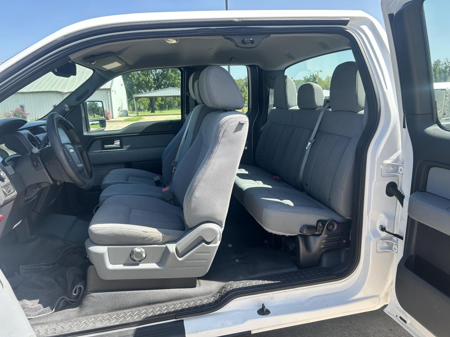 2012 WHITE /Gray Ford F-150 XL (1FTVX1CF1CK) with an 5.0L V8 engine, 6-Speed Automatic transmission, located at 17760 Hwy 62, Morris, OK, 74445, (918) 733-4887, 35.609104, -95.877060 - 2012 FORD F-150 HAS THE 5.0L V8 AND IS 2WD. FEATURES POWER LOCKS, POWER WINDOWS, POWER MIRRORS, AM/FM STEREO, SIRIUS STEREO CD PLAYER, AUXILLARY PORT, CRUISE CONTROL, TRACTION CONTROL, MULTI-FUNCTION STEERING CONTROL, BED LINER, TOOL BOXES, TRAILER BRAKES AND TRAILER HITCH. A PREMIER ALTERNATIVE FUE - Photo#16
