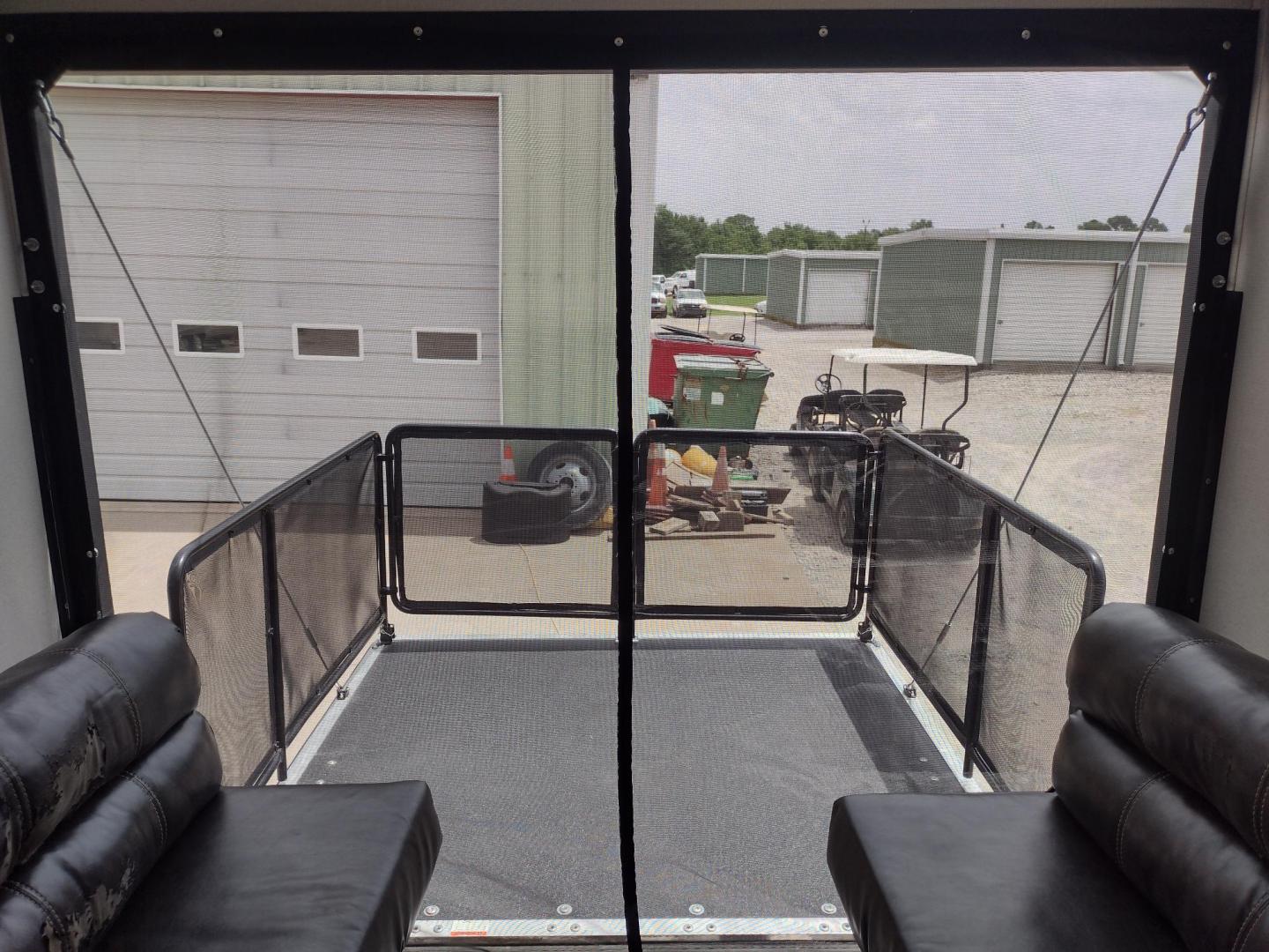 2021 WHITE/BLACK /Gray Keystone SPRINGDALE SG32TH SG32TH (4YDT32T20M3) , located at 17760 Hwy 62, Morris, OK, 74445, 35.609104, -95.877060 - YOUR ADVENTURE AWAITS CHECK OUT THIS 2021 KEYSTONE SPRINGDALE TAILGATOR TOY HAULER SG32TH 36FT OVERALL WITH A 21FT POWER AWNING. IN THE FRONT IS THE BEDROOM WITH A QUEEN SIZE BED, OVERHEAD DOUBLE SHELF, 2 WARDROBE CLOSETS, STORAGE NEXT TO THE BED AND UNDER. IN THE LIVING AND KITCHEN AREA IS THE ENTE - Photo#18