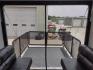 2021 WHITE/BLACK /Gray Keystone SPRINGDALE SG32TH SG32TH (4YDT32T20M3) , located at 17760 Hwy 62, Morris, OK, 74445, 35.609104, -95.877060 - YOUR ADVENTURE AWAITS CHECK OUT THIS 2021 KEYSTONE SPRINGDALE TAILGATOR TOY HAULER SG32TH 36FT OVERALL WITH A 21FT POWER AWNING. IN THE FRONT IS THE BEDROOM WITH A QUEEN SIZE BED, OVERHEAD DOUBLE SHELF, 2 WARDROBE CLOSETS, STORAGE NEXT TO THE BED AND UNDER. IN THE LIVING AND KITCHEN AREA IS THE ENTE - Photo#18