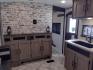 2021 WHITE/BLACK /Gray Keystone SPRINGDALE SG32TH SG32TH (4YDT32T20M3) , located at 17760 Hwy 62, Morris, OK, 74445, 35.609104, -95.877060 - YOUR ADVENTURE AWAITS CHECK OUT THIS 2021 KEYSTONE SPRINGDALE TAILGATOR TOY HAULER SG32TH 36FT OVERALL WITH A 21FT POWER AWNING. IN THE FRONT IS THE BEDROOM WITH A QUEEN SIZE BED, OVERHEAD DOUBLE SHELF, 2 WARDROBE CLOSETS, STORAGE NEXT TO THE BED AND UNDER. IN THE LIVING AND KITCHEN AREA IS THE ENTE - Photo#25