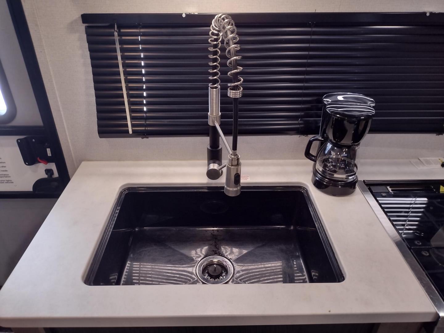 2021 WHITE/BLACK /Gray Keystone SPRINGDALE SG32TH SG32TH (4YDT32T20M3) , located at 17760 Hwy 62, Morris, OK, 74445, 35.609104, -95.877060 - YOUR ADVENTURE AWAITS CHECK OUT THIS 2021 KEYSTONE SPRINGDALE TAILGATOR TOY HAULER SG32TH 36FT OVERALL WITH A 21FT POWER AWNING. IN THE FRONT IS THE BEDROOM WITH A QUEEN SIZE BED, OVERHEAD DOUBLE SHELF, 2 WARDROBE CLOSETS, STORAGE NEXT TO THE BED AND UNDER. IN THE LIVING AND KITCHEN AREA IS THE ENTE - Photo#29