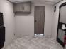 2021 WHITE/BLACK /Gray Keystone SPRINGDALE SG32TH SG32TH (4YDT32T20M3) , located at 17760 Hwy 62, Morris, OK, 74445, 35.609104, -95.877060 - YOUR ADVENTURE AWAITS CHECK OUT THIS 2021 KEYSTONE SPRINGDALE TAILGATOR TOY HAULER SG32TH 36FT OVERALL WITH A 21FT POWER AWNING. IN THE FRONT IS THE BEDROOM WITH A QUEEN SIZE BED, OVERHEAD DOUBLE SHELF, 2 WARDROBE CLOSETS, STORAGE NEXT TO THE BED AND UNDER. IN THE LIVING AND KITCHEN AREA IS THE ENTE - Photo#44