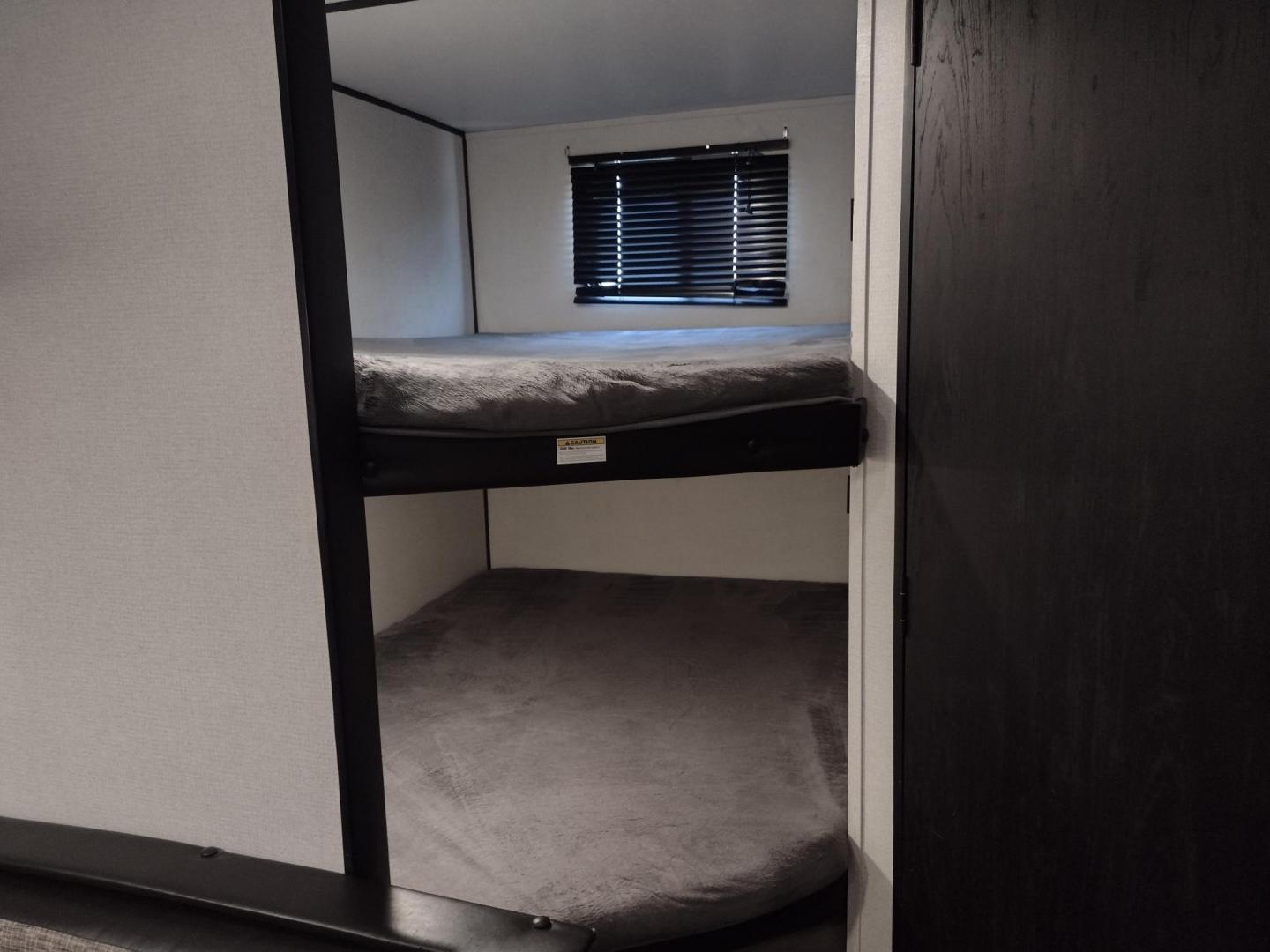 2020 WHITE /Gray Keystone HIDEOUT 262LHS 262LHS (4YDT26225L7) , located at 17760 Hwy 62, Morris, OK, 74445, 35.609104, -95.877060 - CHECK OUT THIS 2020 KEYSTONE HIDEOUT 262LHS 29FT OVERALL WITH 12FT POWER AWNING. IN THE FRONT OF THE CAMPER IS THE QUEEN SIZE BED WITH STORAGE UNDER THE BED, OVERHEAD SHELF, 2 WARDROBE CLOSETS, AND LAUNDRY CHUTE. IN THE LIVING AND KITCHEN AREA IS A VINYL SOFA THAT FOLDS DOWN FOR ADDITIONAL SLEEPING, - Photo#32