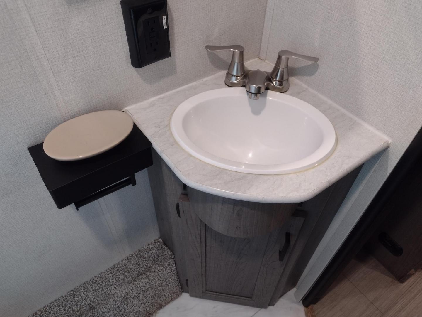 2020 WHITE /Gray Keystone HIDEOUT 262LHS 262LHS (4YDT26225L7) , located at 17760 Hwy 62, Morris, OK, 74445, 35.609104, -95.877060 - CHECK OUT THIS 2020 KEYSTONE HIDEOUT 262LHS 29FT OVERALL WITH 12FT POWER AWNING. IN THE FRONT OF THE CAMPER IS THE QUEEN SIZE BED WITH STORAGE UNDER THE BED, OVERHEAD SHELF, 2 WARDROBE CLOSETS, AND LAUNDRY CHUTE. IN THE LIVING AND KITCHEN AREA IS A VINYL SOFA THAT FOLDS DOWN FOR ADDITIONAL SLEEPING, - Photo#36