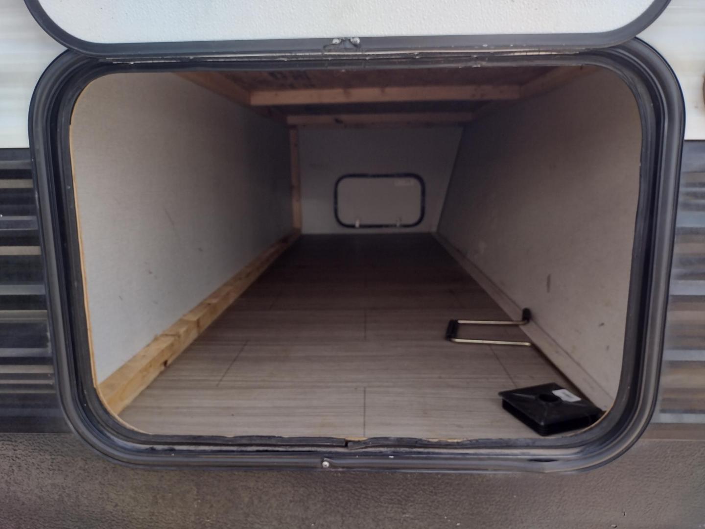 2020 WHITE /Gray Keystone HIDEOUT 262LHS 262LHS (4YDT26225L7) , located at 17760 Hwy 62, Morris, OK, 74445, 35.609104, -95.877060 - CHECK OUT THIS 2020 KEYSTONE HIDEOUT 262LHS 29FT OVERALL WITH 12FT POWER AWNING. IN THE FRONT OF THE CAMPER IS THE QUEEN SIZE BED WITH STORAGE UNDER THE BED, OVERHEAD SHELF, 2 WARDROBE CLOSETS, AND LAUNDRY CHUTE. IN THE LIVING AND KITCHEN AREA IS A VINYL SOFA THAT FOLDS DOWN FOR ADDITIONAL SLEEPING, - Photo#38