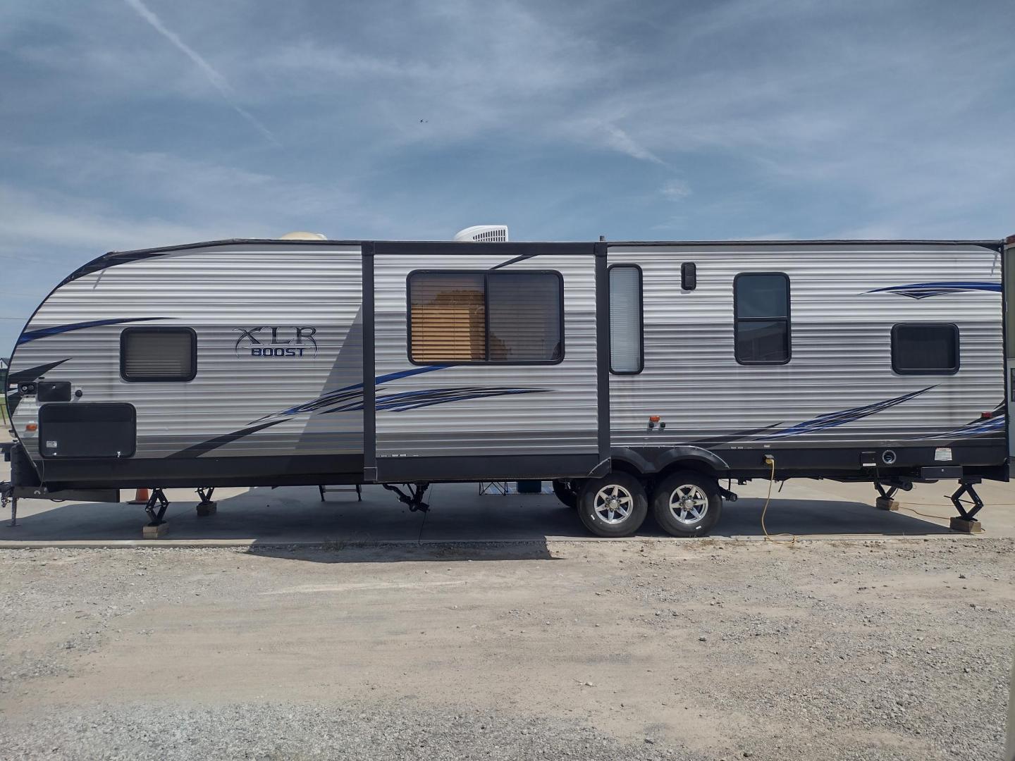 2018 Silver /Gray Forest River XLR Toy Hauler 31QB (5ZT2XLWB1J1) , located at 17760 Hwy 62, Morris, OK, 74445, 35.609104, -95.877060 - CHECK OUT THIS 2018 FOREST RIVER XLR BOOST 31QB 39FT OVERALL WITH 15FT POWER AWNING. IN THE FRONT IS THE BEDROOM WITH QUEEN SIZE BED, OVERHEAD CABINETS, 2 WARDROBE CLOSETS, AND STORAGE UNDER THE BED. CONNECTED TO THE BEDROOM IS A FULL BATH WITH VANITY SINK, MEDICINE CABINET, AND STANDING SHOWER. IN - Photo#4