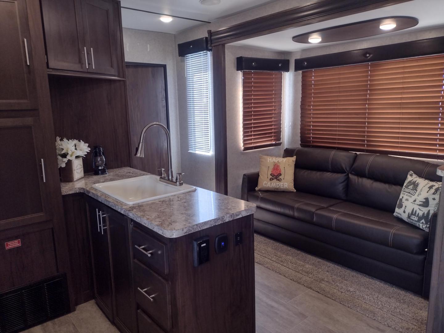 2018 Silver /Gray Forest River XLR Toy Hauler 31QB (5ZT2XLWB1J1) , located at 17760 Hwy 62, Morris, OK, 74445, 35.609104, -95.877060 - CHECK OUT THIS 2018 FOREST RIVER XLR BOOST 31QB 39FT OVERALL WITH 15FT POWER AWNING. IN THE FRONT IS THE BEDROOM WITH QUEEN SIZE BED, OVERHEAD CABINETS, 2 WARDROBE CLOSETS, AND STORAGE UNDER THE BED. CONNECTED TO THE BEDROOM IS A FULL BATH WITH VANITY SINK, MEDICINE CABINET, AND STANDING SHOWER. IN - Photo#23