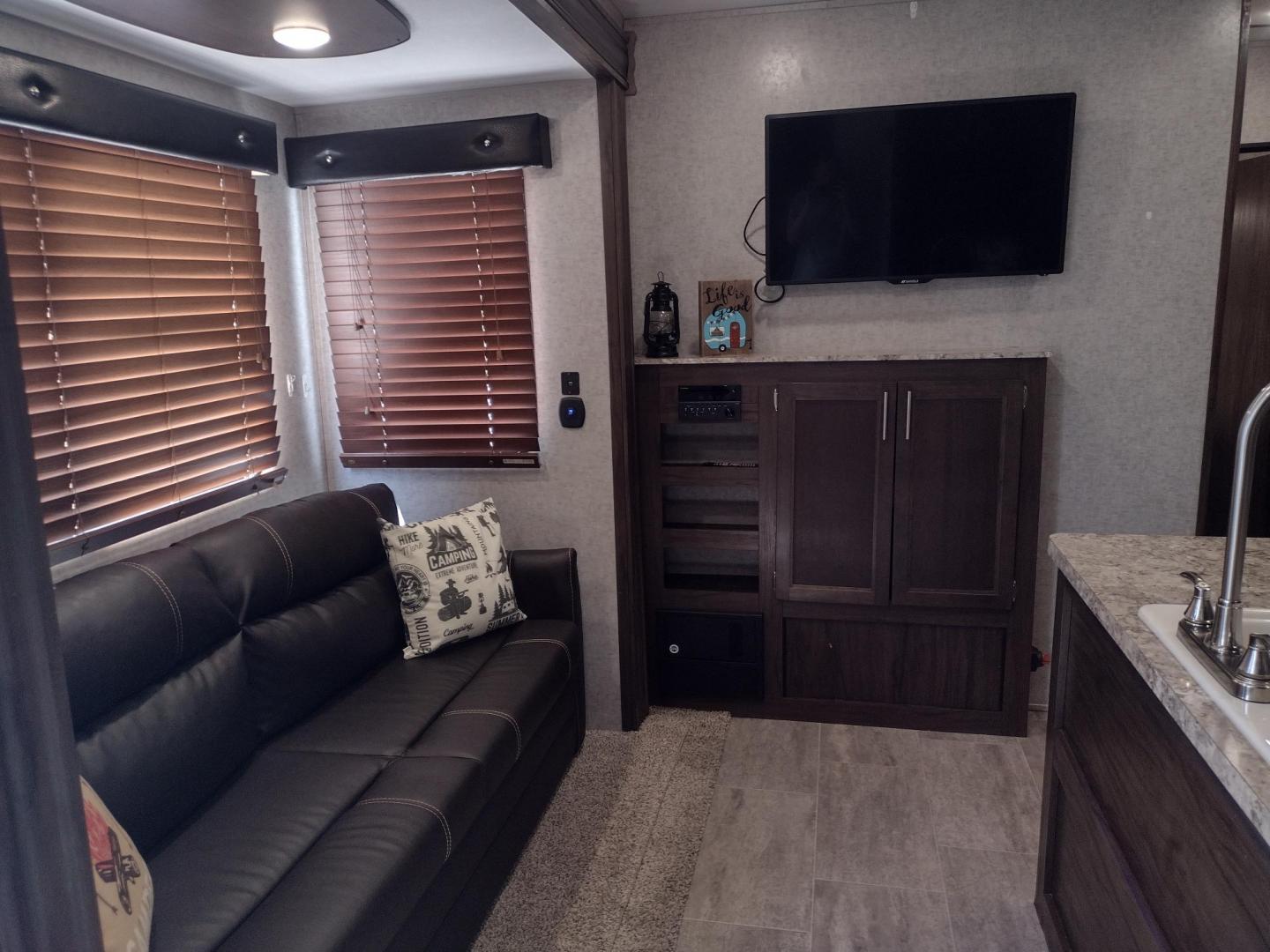 2018 Silver /Gray Forest River XLR Toy Hauler 31QB (5ZT2XLWB1J1) , located at 17760 Hwy 62, Morris, OK, 74445, 35.609104, -95.877060 - CHECK OUT THIS 2018 FOREST RIVER XLR BOOST 31QB 39FT OVERALL WITH 15FT POWER AWNING. IN THE FRONT IS THE BEDROOM WITH QUEEN SIZE BED, OVERHEAD CABINETS, 2 WARDROBE CLOSETS, AND STORAGE UNDER THE BED. CONNECTED TO THE BEDROOM IS A FULL BATH WITH VANITY SINK, MEDICINE CABINET, AND STANDING SHOWER. IN - Photo#25