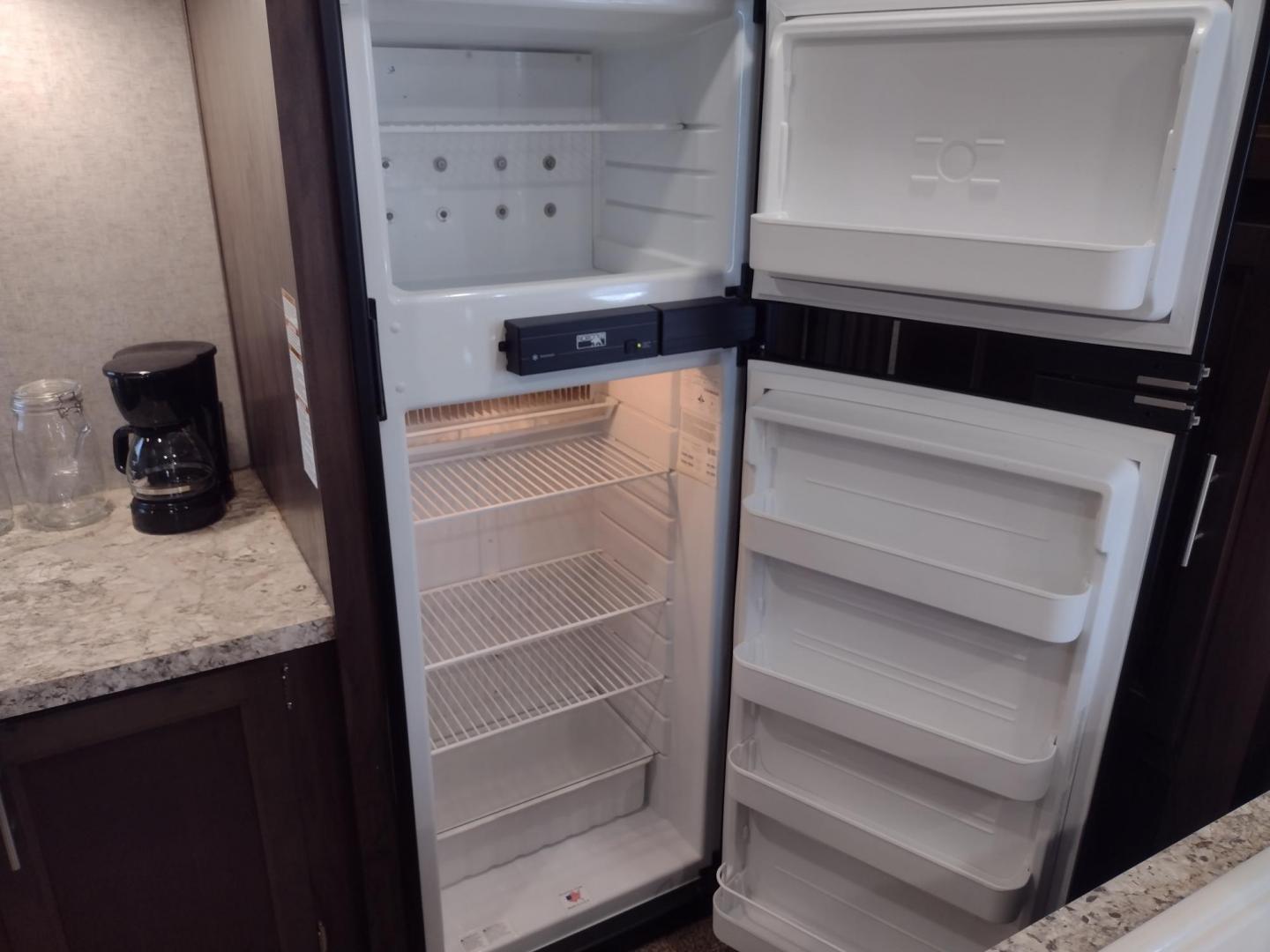 2018 Silver /Gray Forest River XLR Toy Hauler 31QB (5ZT2XLWB1J1) , located at 17760 Hwy 62, Morris, OK, 74445, 35.609104, -95.877060 - CHECK OUT THIS 2018 FOREST RIVER XLR BOOST 31QB 39FT OVERALL WITH 15FT POWER AWNING. IN THE FRONT IS THE BEDROOM WITH QUEEN SIZE BED, OVERHEAD CABINETS, 2 WARDROBE CLOSETS, AND STORAGE UNDER THE BED. CONNECTED TO THE BEDROOM IS A FULL BATH WITH VANITY SINK, MEDICINE CABINET, AND STANDING SHOWER. IN - Photo#29