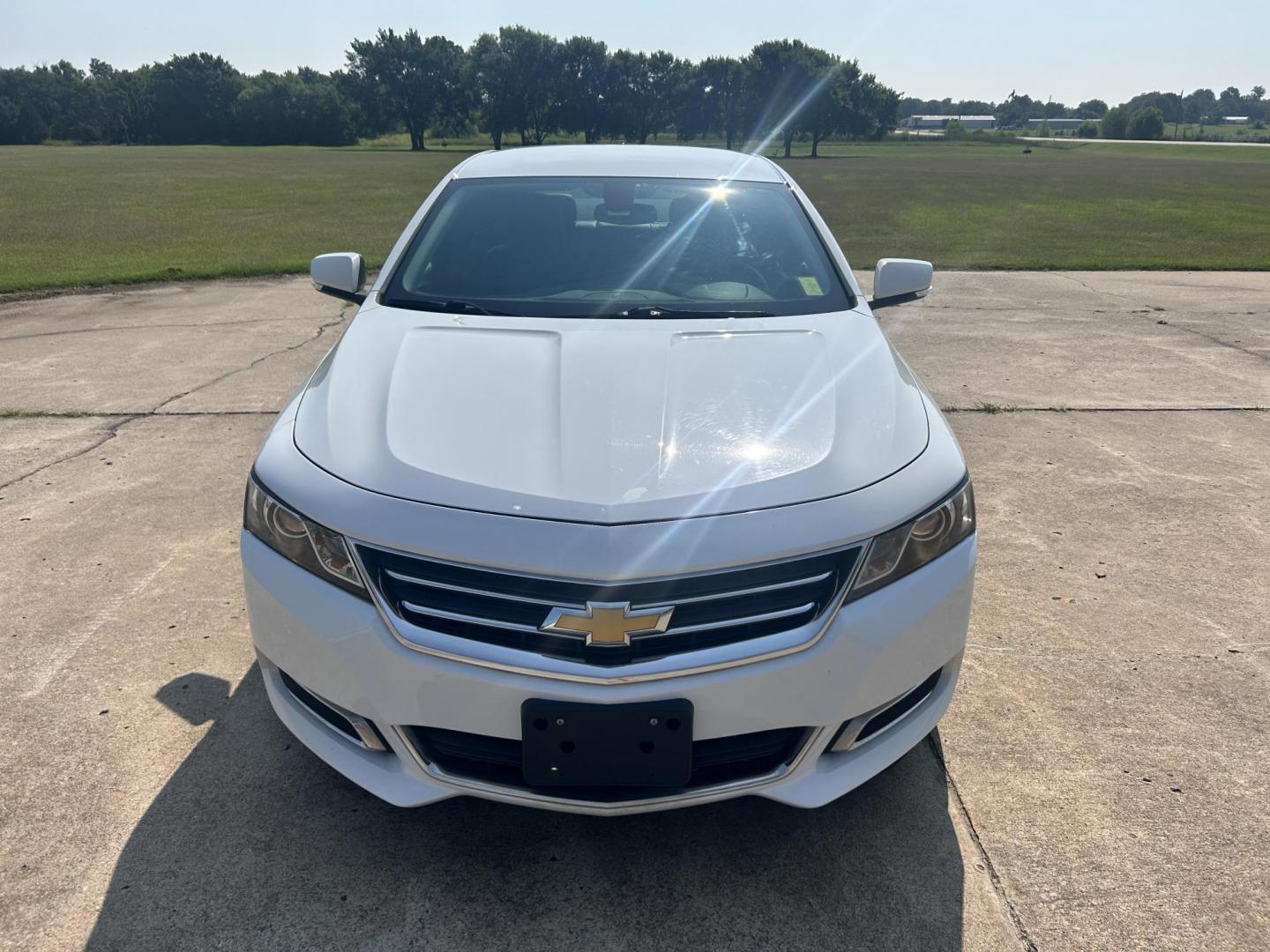 2015 WHITE /Gray Chevrolet Impala (2G1135SN4F9) with an 3.6L V6 DOHC 24V CNG engine, 6A transmission, located at 17760 Hwy 62, Morris, OK, 74445, (918) 733-4887, 35.609104, -95.877060 - 2015 CHEVY IMPALA HAS THE 3.6 V6 ENGINE AND IS FWD. THE IMPALA IS A BI-FUEL CAR THAT RUNS ON BOTH CNG (COMPRESSED NATUAL GAS) OR GASOLINE. THIS CAR FEATURES KEYLESS REMOTE START, KEYLESS REMOTE ENTRY, POWER LOCKS, POWER WINDOWS, POWER SEATS, POWER MIRRORS, AM/FM STEREO, CLOTH SEATS, BACK UP CAMERA, - Photo#1