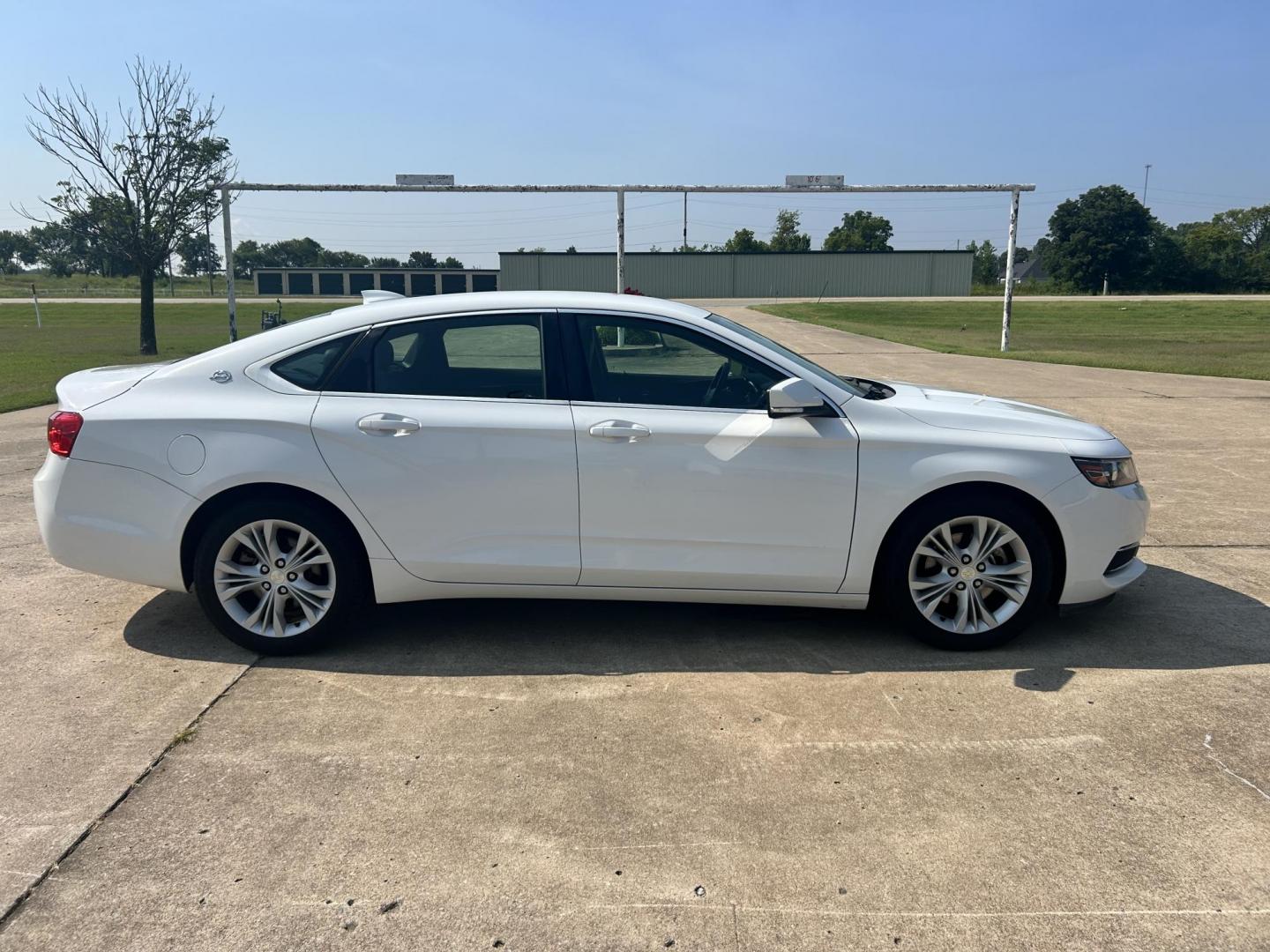 2015 WHITE /Gray Chevrolet Impala (2G1135SN4F9) with an 3.6L V6 DOHC 24V CNG engine, 6A transmission, located at 17760 Hwy 62, Morris, OK, 74445, (918) 733-4887, 35.609104, -95.877060 - 2015 CHEVY IMPALA HAS THE 3.6 V6 ENGINE AND IS FWD. THE IMPALA IS A BI-FUEL CAR THAT RUNS ON BOTH CNG (COMPRESSED NATUAL GAS) OR GASOLINE. THIS CAR FEATURES KEYLESS REMOTE START, KEYLESS REMOTE ENTRY, POWER LOCKS, POWER WINDOWS, POWER SEATS, POWER MIRRORS, AM/FM STEREO, CLOTH SEATS, BACK UP CAMERA, - Photo#3
