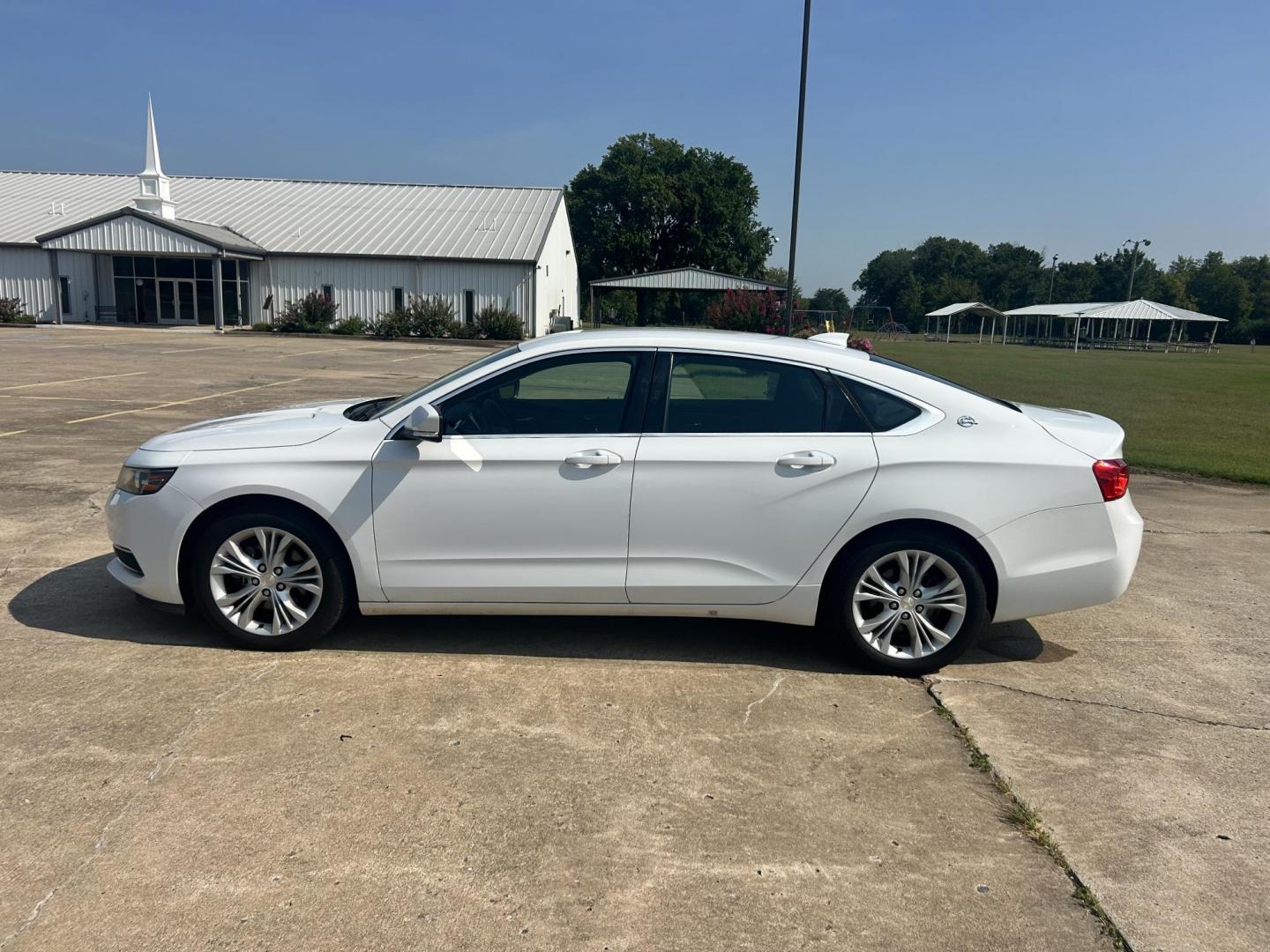 2015 WHITE /Gray Chevrolet Impala (2G1135SN4F9) with an 3.6L V6 DOHC 24V CNG engine, 6A transmission, located at 17760 Hwy 62, Morris, OK, 74445, (918) 733-4887, 35.609104, -95.877060 - 2015 CHEVY IMPALA HAS THE 3.6 V6 ENGINE AND IS FWD. THE IMPALA IS A BI-FUEL CAR THAT RUNS ON BOTH CNG (COMPRESSED NATUAL GAS) OR GASOLINE. THIS CAR FEATURES KEYLESS REMOTE START, KEYLESS REMOTE ENTRY, POWER LOCKS, POWER WINDOWS, POWER SEATS, POWER MIRRORS, AM/FM STEREO, CLOTH SEATS, BACK UP CAMERA, - Photo#7