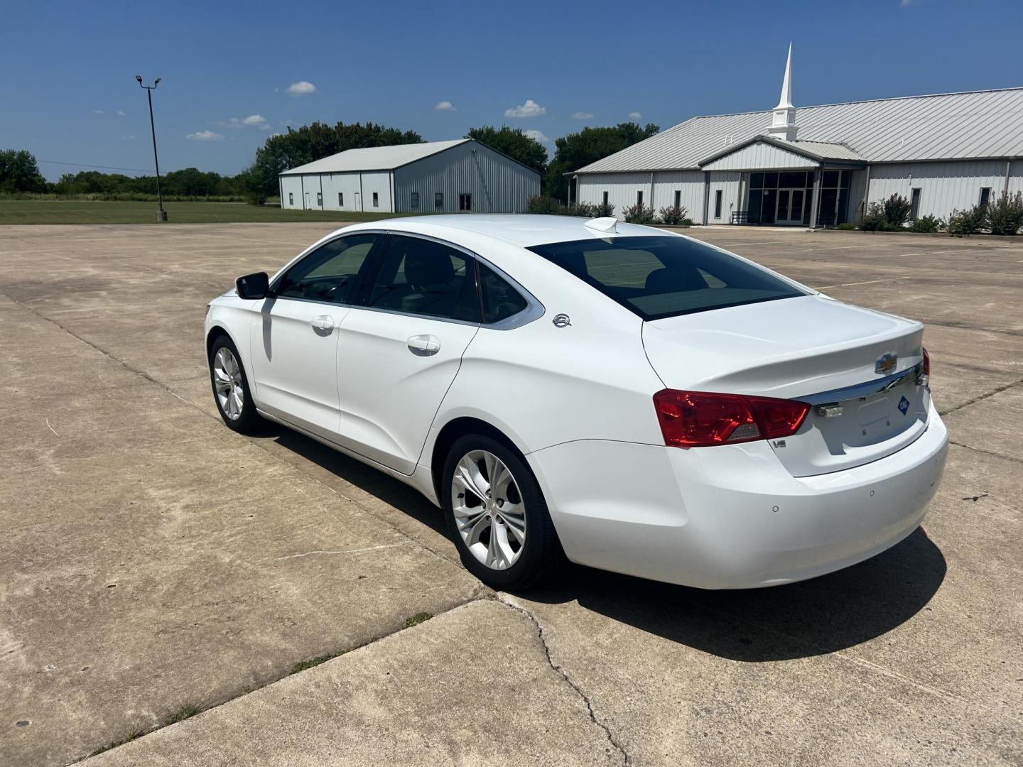 2015 WHITE /Gray Chevrolet Impala (2G1135SN5F9) with an 3.6L V6 DOHC 24V CNG engine, 6A transmission, located at 17760 Hwy 62, Morris, OK, 74445, (918) 733-4887, 35.609104, -95.877060 - 2015 CHEVY IMPALA HAS THE 3.6 V6 ENGINE AND IS FWD. THE IMPALA IS A BI-FUEL CAR THAT RUNS ON BOTH CNG (COMPRESSED NATUAL GAS) OR GASOLINE. THIS CAR FEATURES KEYLESS REMOTE START, KEYLESS REMOTE ENTRY, POWER LOCKS, POWER WINDOWS, POWER SEATS, POWER MIRRORS, AM/FM STEREO, CLOTH SEATS, BACK UP CAMERA, - Photo#6