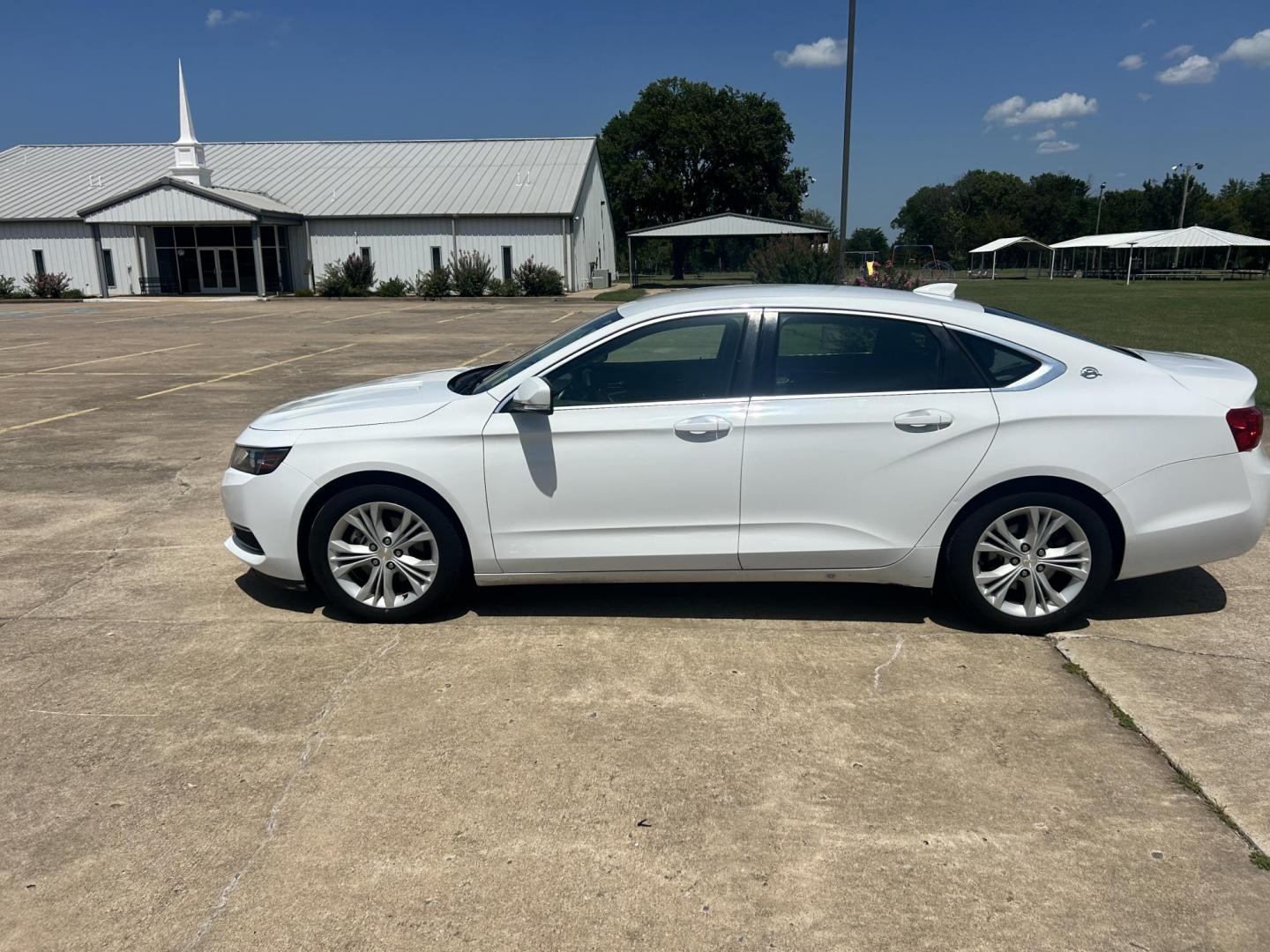 2015 WHITE /Gray Chevrolet Impala (2G1135SN5F9) with an 3.6L V6 DOHC 24V CNG engine, 6A transmission, located at 17760 Hwy 62, Morris, OK, 74445, (918) 733-4887, 35.609104, -95.877060 - 2015 CHEVY IMPALA HAS THE 3.6 V6 ENGINE AND IS FWD. THE IMPALA IS A BI-FUEL CAR THAT RUNS ON BOTH CNG (COMPRESSED NATUAL GAS) OR GASOLINE. THIS CAR FEATURES KEYLESS REMOTE START, KEYLESS REMOTE ENTRY, POWER LOCKS, POWER WINDOWS, POWER SEATS, POWER MIRRORS, AM/FM STEREO, CLOTH SEATS, BACK UP CAMERA, - Photo#7