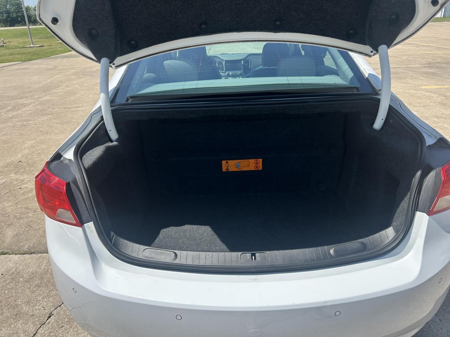 2015 WHITE /Gray Chevrolet Impala (2G1135SN5F9) with an 3.6L V6 DOHC 24V CNG engine, 6A transmission, located at 17760 Hwy 62, Morris, OK, 74445, (918) 733-4887, 35.609104, -95.877060 - 2015 CHEVY IMPALA HAS THE 3.6 V6 ENGINE AND IS FWD. THE IMPALA IS A BI-FUEL CAR THAT RUNS ON BOTH CNG (COMPRESSED NATUAL GAS) OR GASOLINE. THIS CAR FEATURES KEYLESS REMOTE START, KEYLESS REMOTE ENTRY, POWER LOCKS, POWER WINDOWS, POWER SEATS, POWER MIRRORS, AM/FM STEREO, CLOTH SEATS, BACK UP CAMERA, - Photo#17