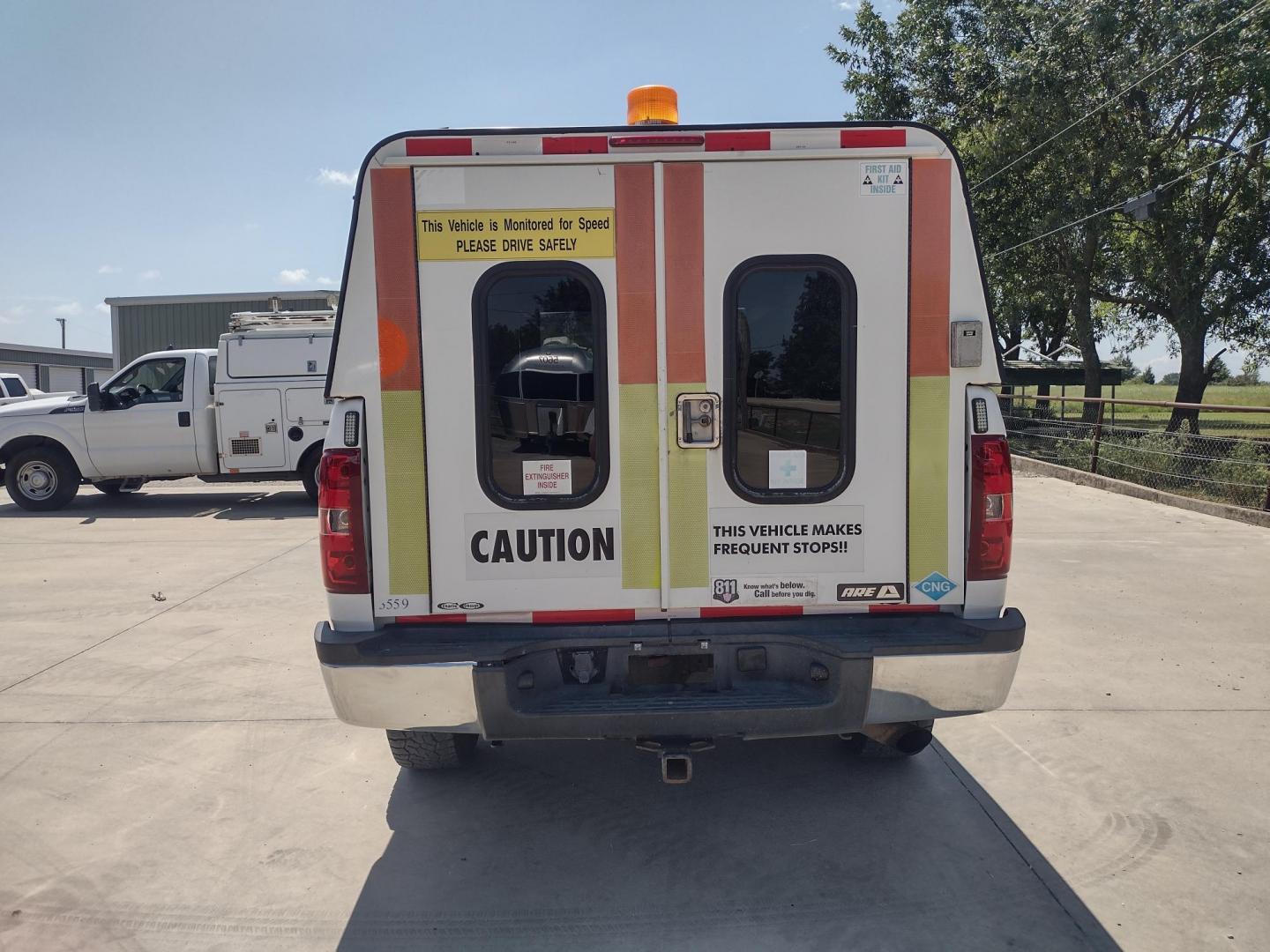 2013 WHITE /Gray Chevrolet Silverado 2500HD Work Truck Ext. Cab 4WD (1GC2KVCB1DZ) with an 6.0L V8 OHV 16V CNG engine, 6-Speed Automatic transmission, located at 17760 Hwy 62, Morris, OK, 74445, (918) 733-4887, 35.609104, -95.877060 - 2013 CHEVY SILVERADO 4WD WITH THE 6.0L V8 ENGINE. THIS TRUCK FEATURES MANUAL WINDOWS, MANUAL LOCKS, MANUAL MIRRORS, MANUAL SEATS, LEATHER INTERIOR, CRUSIE CONTROL, TRACTION CONTROL, AND AM/FM RADIO. CAMPER SHELL WITH SHELVES AND CARGO SLIDER, DIMENSIONS INVERTER AND TRAILER HITCH. ONLY 184,332 MILE - Photo#5