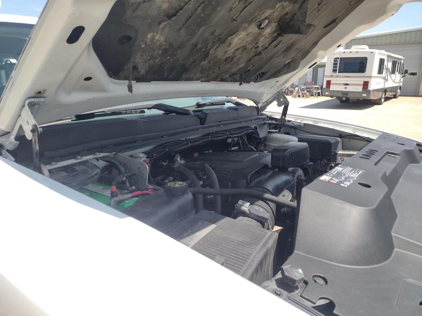 2013 WHITE /Gray Chevrolet Silverado 2500HD Work Truck Ext. Cab 4WD (1GC2KVCB1DZ) with an 6.0L V8 OHV 16V CNG engine, 6-Speed Automatic transmission, located at 17760 Hwy 62, Morris, OK, 74445, (918) 733-4887, 35.609104, -95.877060 - 2013 CHEVY SILVERADO 4WD WITH THE 6.0L V8 ENGINE. THIS TRUCK FEATURES MANUAL WINDOWS, MANUAL LOCKS, MANUAL MIRRORS, MANUAL SEATS, LEATHER INTERIOR, CRUSIE CONTROL, TRACTION CONTROL, AND AM/FM RADIO. CAMPER SHELL WITH SHELVES AND CARGO SLIDER, DIMENSIONS INVERTER AND TRAILER HITCH. ONLY 184,332 MILE - Photo#24