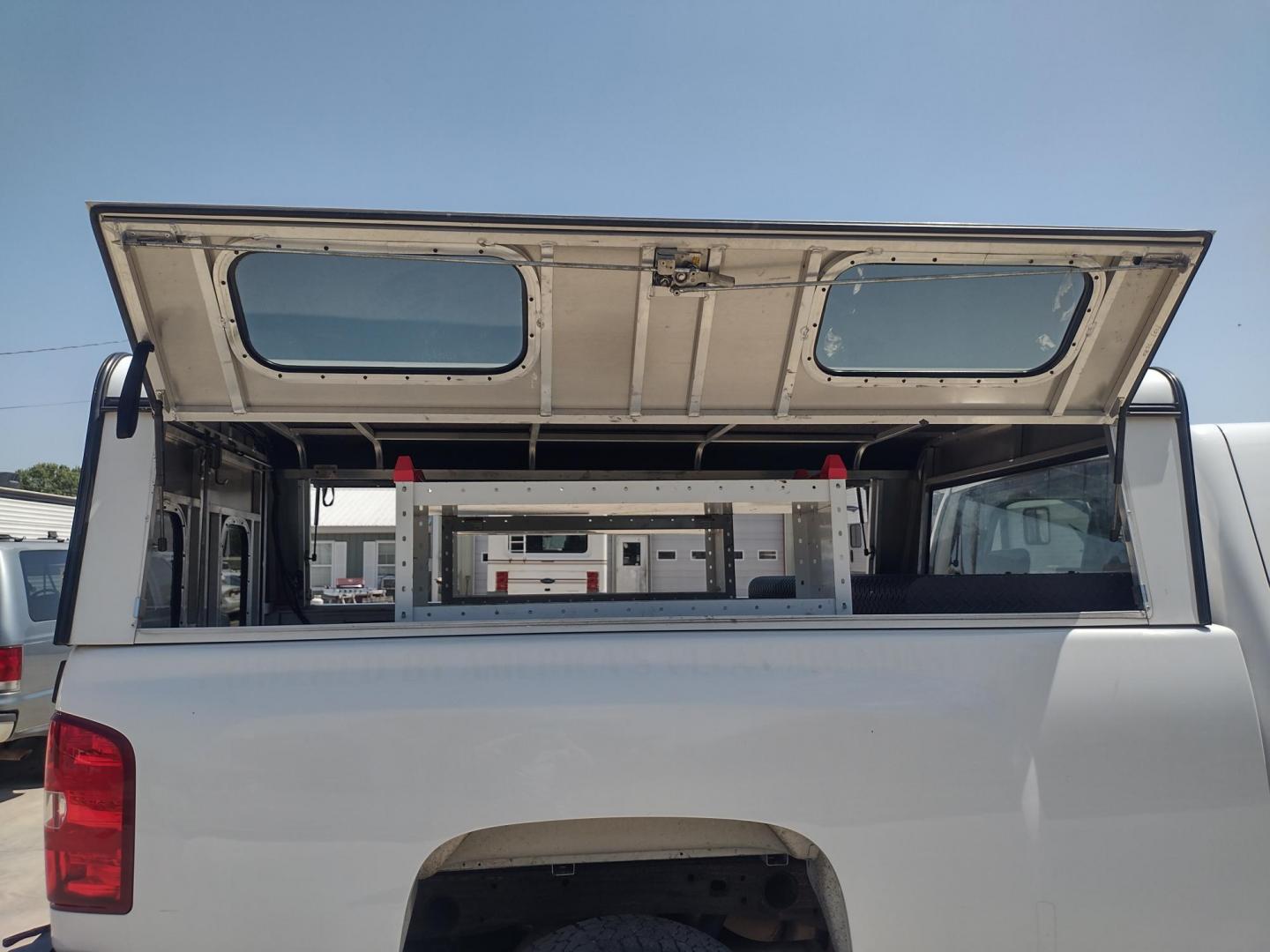 2013 WHITE /Gray Chevrolet Silverado 2500HD Work Truck Ext. Cab 4WD (1GC2KVCB1DZ) with an 6.0L V8 OHV 16V CNG engine, 6-Speed Automatic transmission, located at 17760 Hwy 62, Morris, OK, 74445, (918) 733-4887, 35.609104, -95.877060 - 2013 CHEVY SILVERADO 4WD WITH THE 6.0L V8 ENGINE. THIS TRUCK FEATURES MANUAL WINDOWS, MANUAL LOCKS, MANUAL MIRRORS, MANUAL SEATS, LEATHER INTERIOR, CRUSIE CONTROL, TRACTION CONTROL, AND AM/FM RADIO. CAMPER SHELL WITH SHELVES AND CARGO SLIDER, DIMENSIONS INVERTER AND TRAILER HITCH. ONLY 184,332 MILE - Photo#26