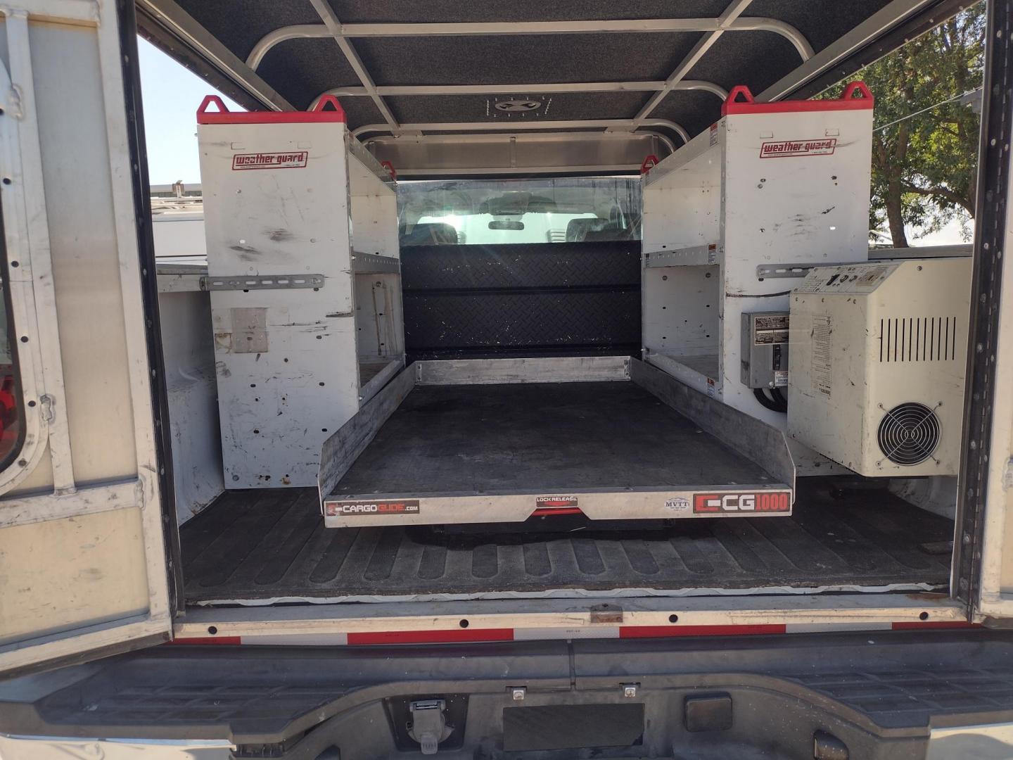 2013 WHITE /Gray Chevrolet Silverado 2500HD Work Truck Ext. Cab 4WD (1GC2KVCB1DZ) with an 6.0L V8 OHV 16V CNG engine, 6-Speed Automatic transmission, located at 17760 Hwy 62, Morris, OK, 74445, (918) 733-4887, 35.609104, -95.877060 - 2013 CHEVY SILVERADO 4WD WITH THE 6.0L V8 ENGINE. THIS TRUCK FEATURES MANUAL WINDOWS, MANUAL LOCKS, MANUAL MIRRORS, MANUAL SEATS, LEATHER INTERIOR, CRUSIE CONTROL, TRACTION CONTROL, AND AM/FM RADIO. CAMPER SHELL WITH SHELVES AND CARGO SLIDER, DIMENSIONS INVERTER AND TRAILER HITCH. ONLY 184,332 MILE - Photo#27
