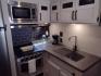 2022 WHITE /Gray Forest River PUMA XLE LITE 23BHC 23BHC (5ZT2PUMB9N4) , located at 17760 Hwy 62, Morris, OK, 74445, 35.609104, -95.877060 - READY FOR AN ADVENTURE CHECK OUT THIS 2022 FOREST RIVER PUMA XLE LITE 23BHC 30FT OVERALL WITH 19FT POWER AWNING. IN THE FRONT IS THE BEDROOM WITH A QUEEN SIZE BED AND STORAGE UNDER THE BED, OVERHEAD SHELF, AND 2 WARDROBE CLOSETS. IN THE LIVING AND KITCHEN AREA IS STAINLESS STEEL FARM STYLE SINK, 3 B - Photo#12