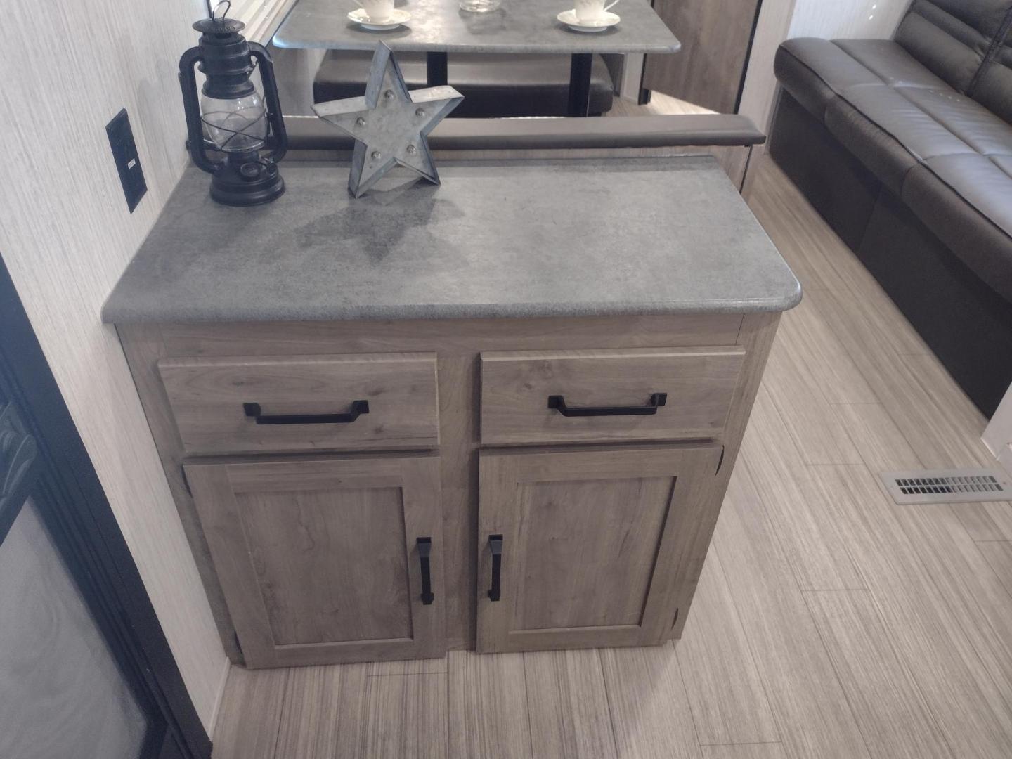2022 WHITE /Gray Forest River PUMA XLE LITE 23BHC 23BHC (5ZT2PUMB9N4) , located at 17760 Hwy 62, Morris, OK, 74445, 35.609104, -95.877060 - READY FOR AN ADVENTURE CHECK OUT THIS 2022 FOREST RIVER PUMA XLE LITE 23BHC 30FT OVERALL WITH 19FT POWER AWNING. IN THE FRONT IS THE BEDROOM WITH A QUEEN SIZE BED AND STORAGE UNDER THE BED, OVERHEAD SHELF, AND 2 WARDROBE CLOSETS. IN THE LIVING AND KITCHEN AREA IS STAINLESS STEEL FARM STYLE SINK, 3 B - Photo#18